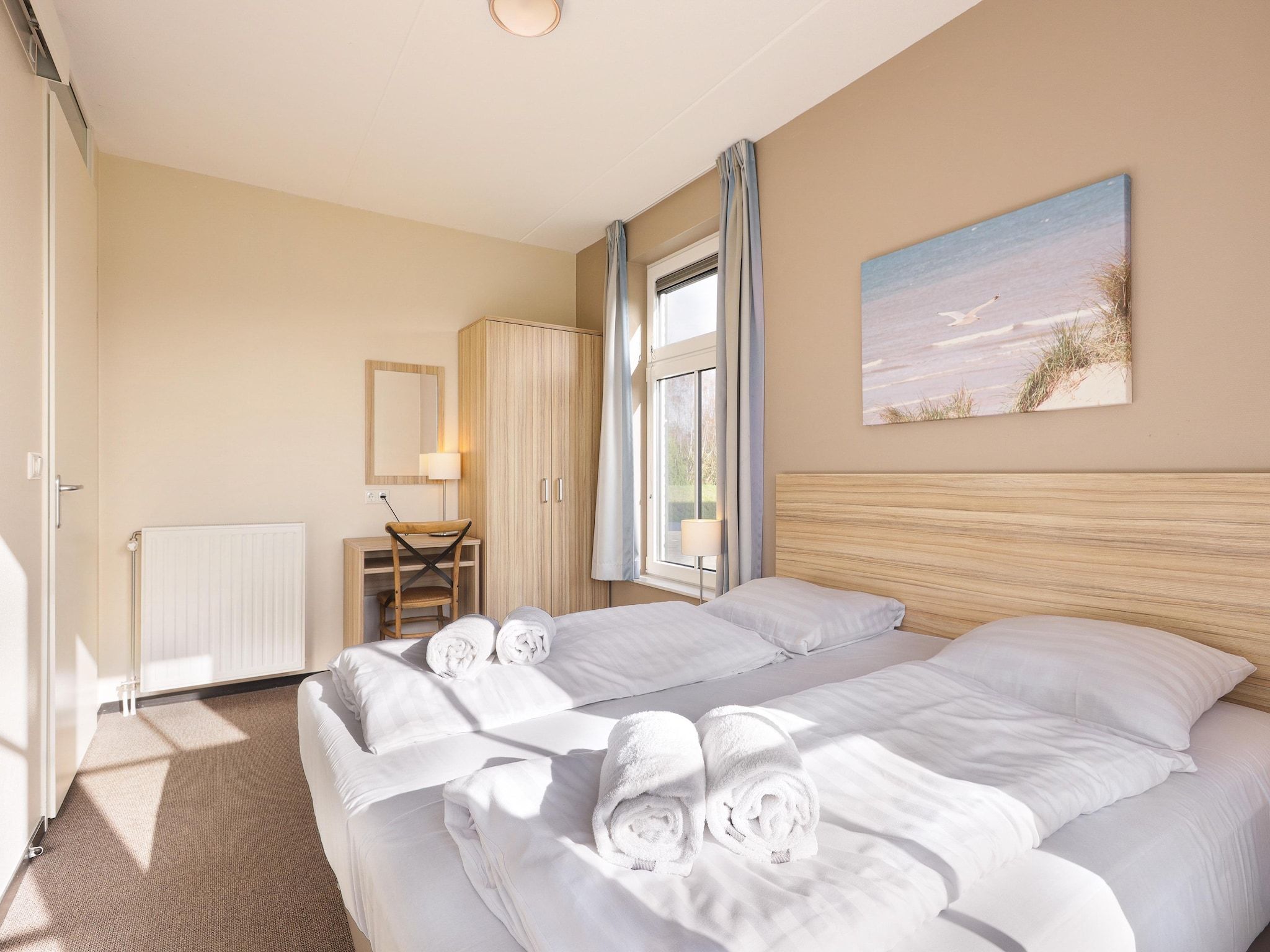 Een slaapkamer van Strand Resort Nieuwvliet-Bad 11 in Nieuwvliet