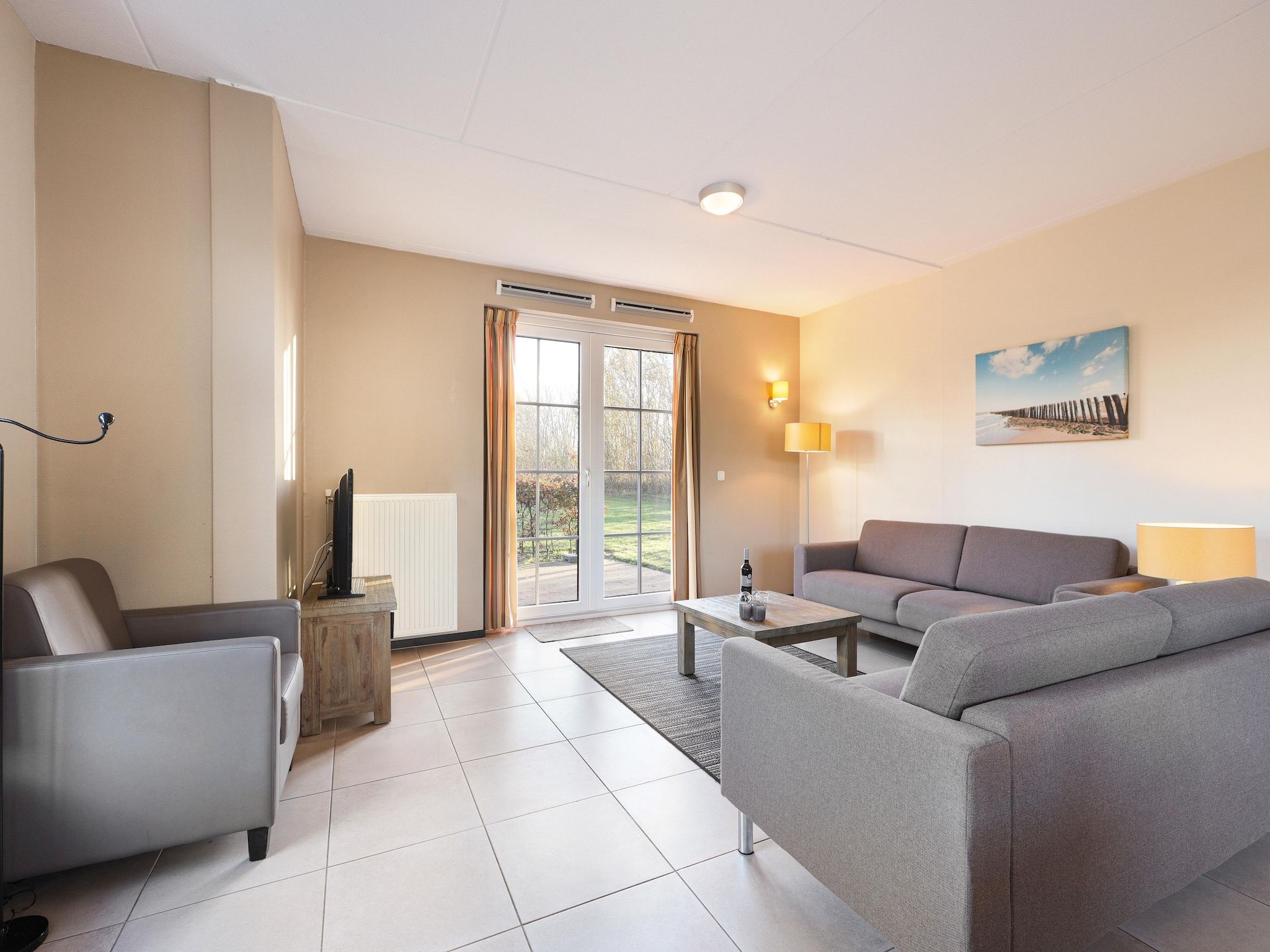 De woonkamer van Strand Resort Nieuwvliet-Bad 12 in Nieuwvliet