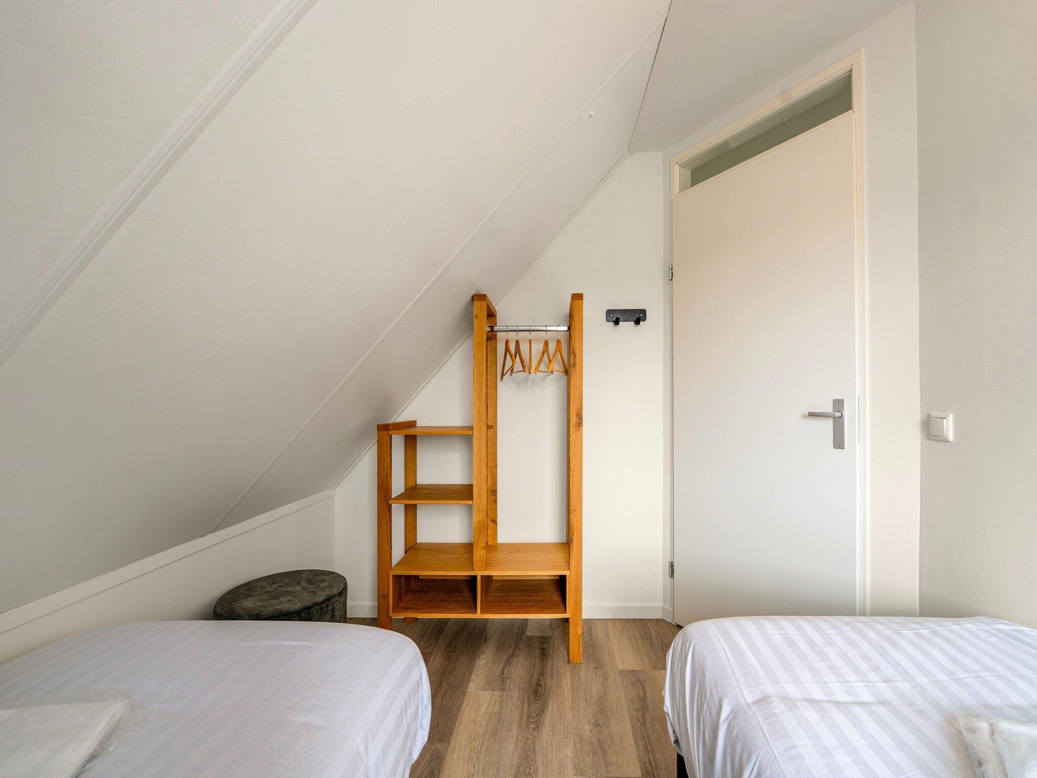 Een slaapkamer van Kuifduiker 115 in Simonshaven