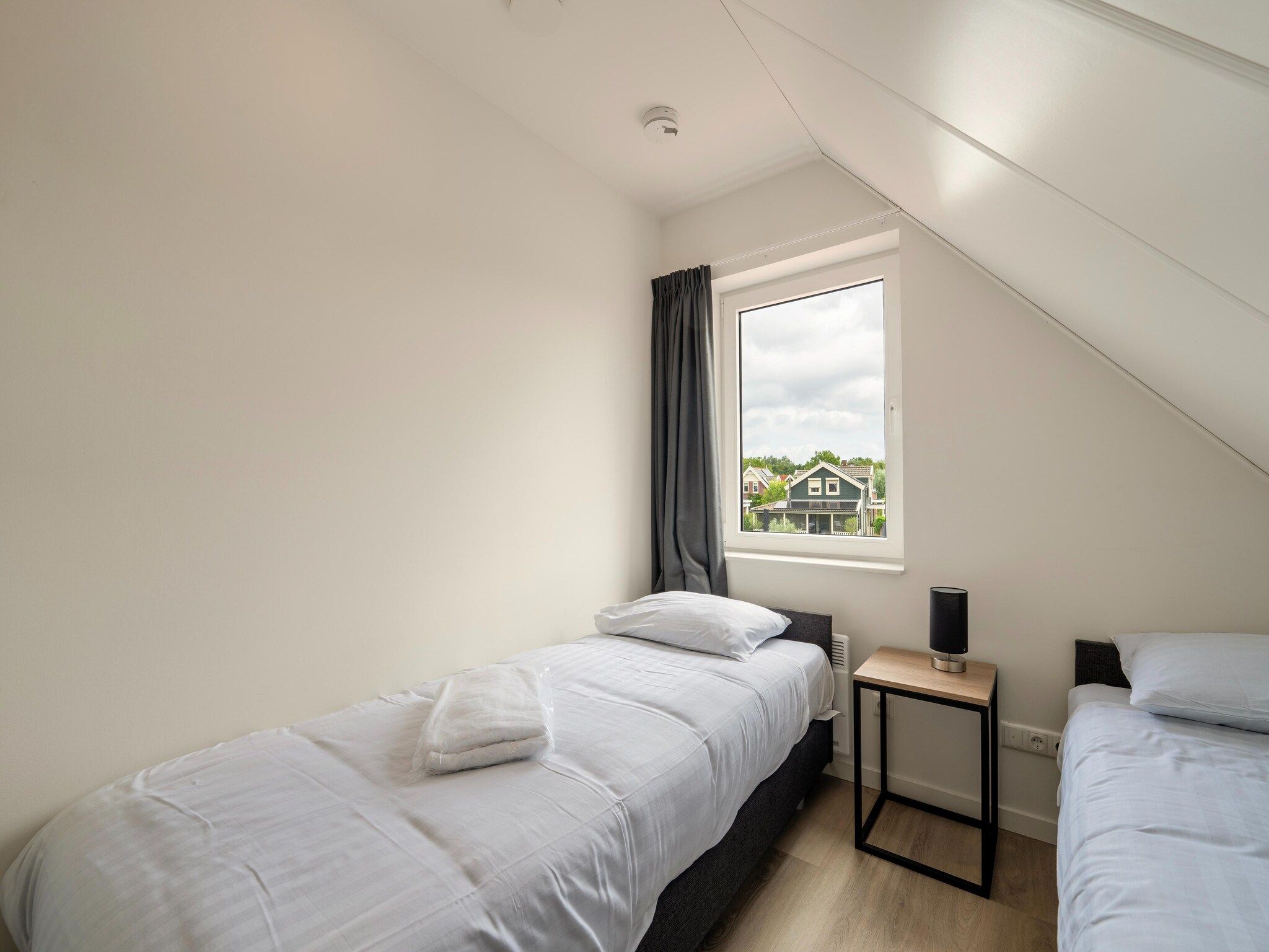 Een slaapkamer van Kuifduiker 115 in Simonshaven