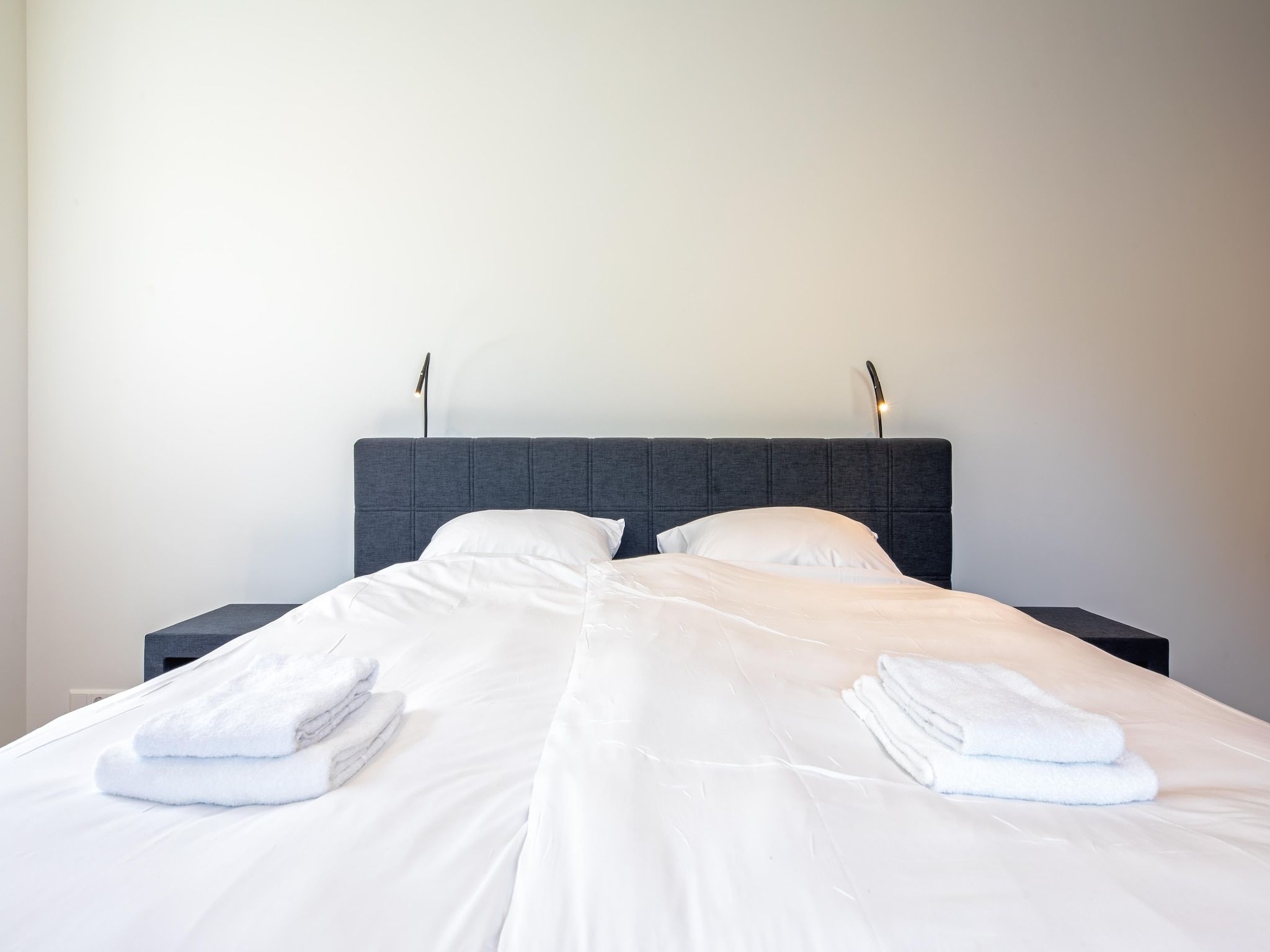 Een slaapkamer van Familievilla Nieuw-Zeeland in Oosterend