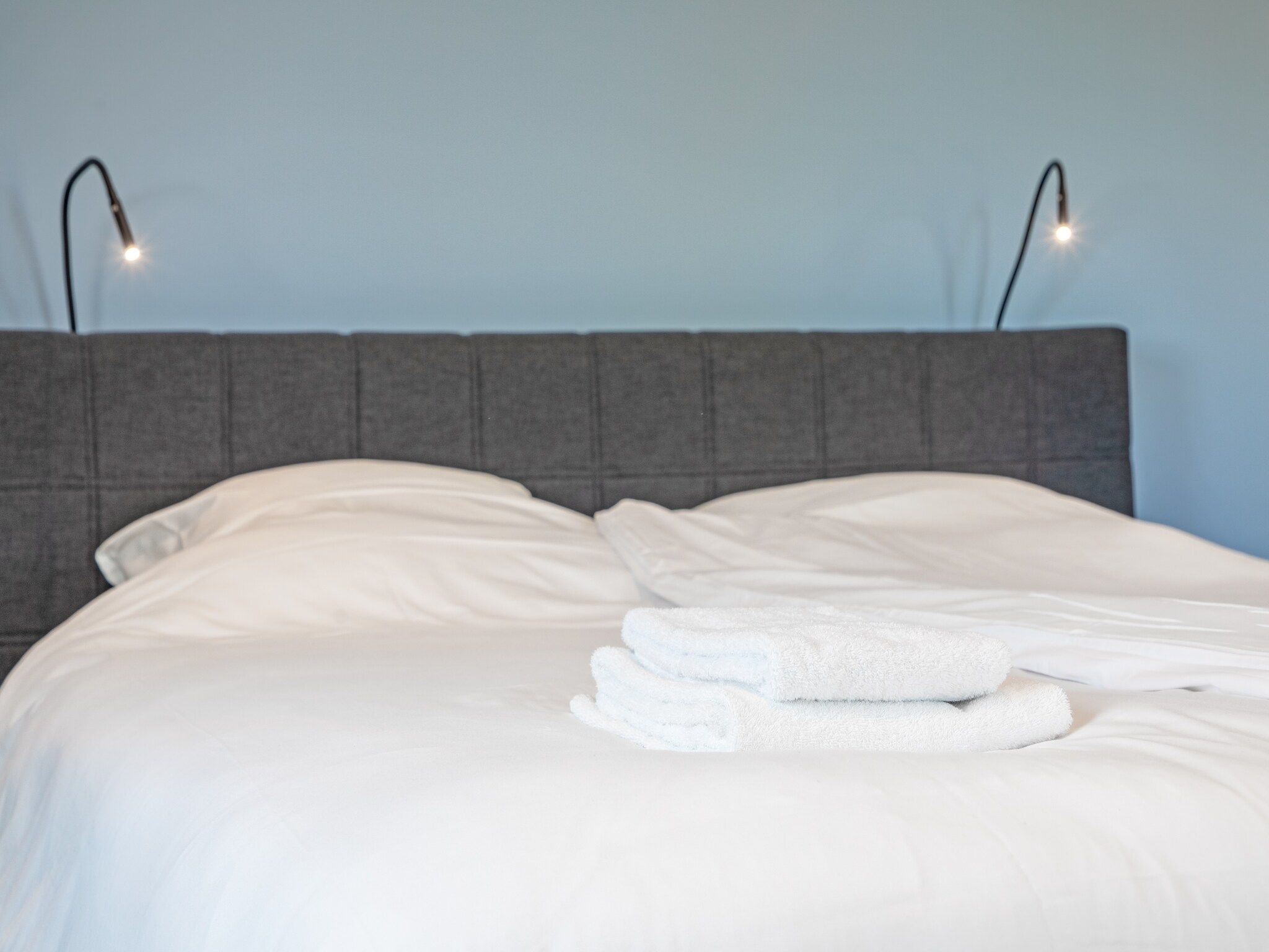 Een slaapkamer van Familievilla Nieuw-Zeeland in Oosterend