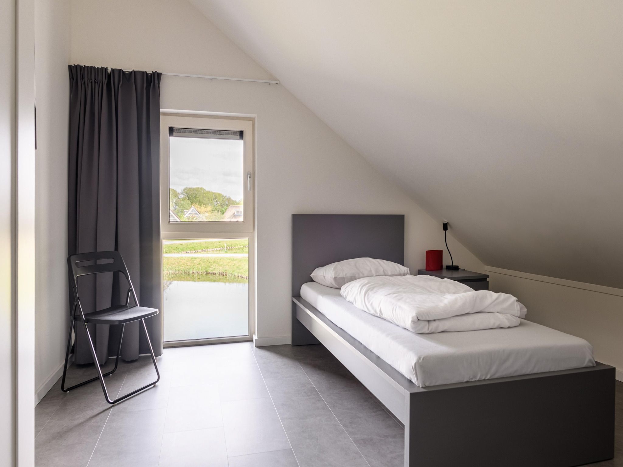 Een slaapkamer van Villapark Akenveen 7 in Tynaarlo