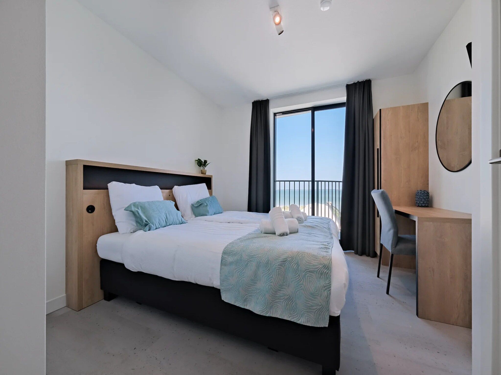 Een slaapkamer van Breskens Apartments & Penthouses 10 in Breskens