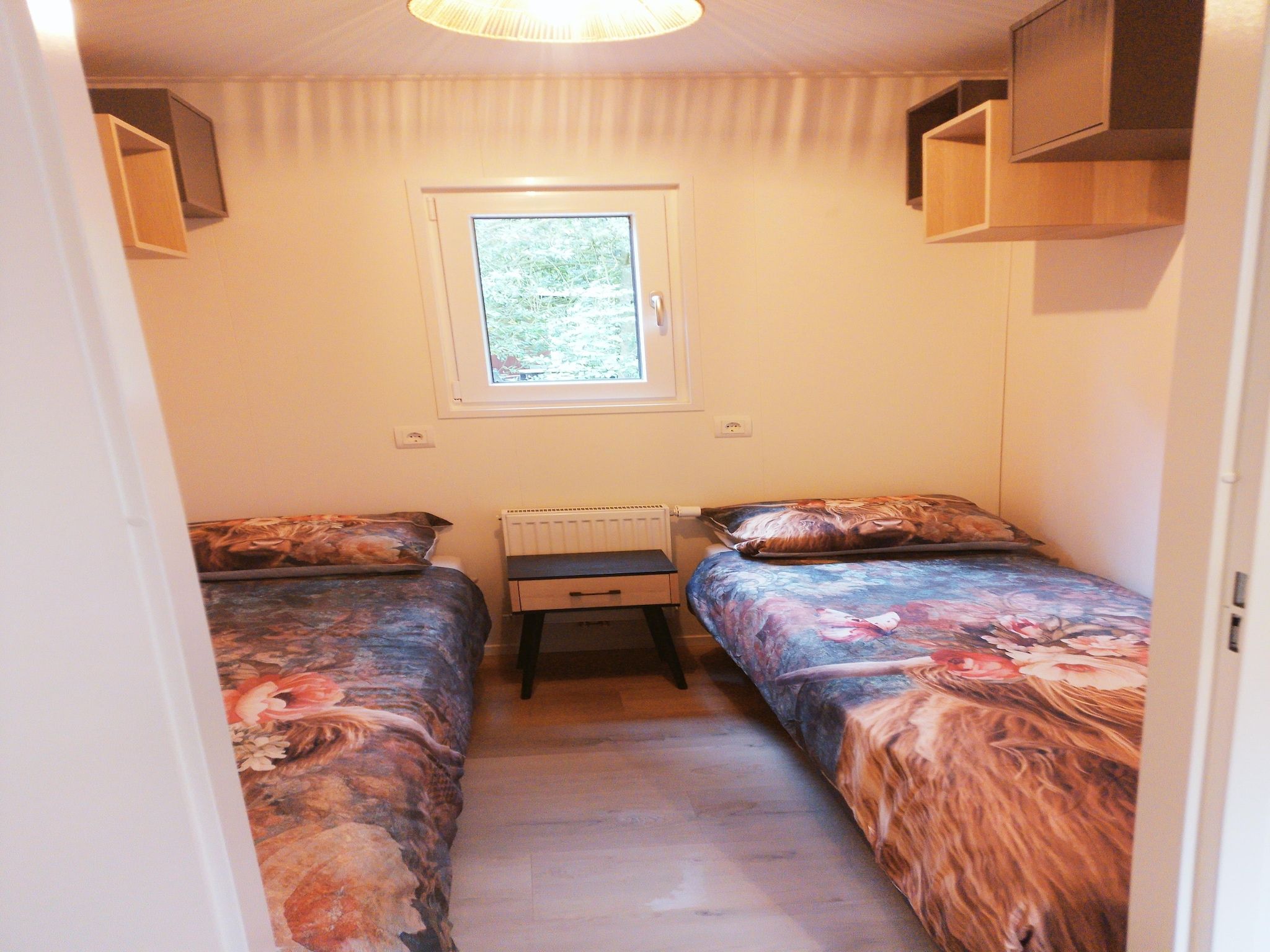 Een slaapkamer van Lodge David in Hattemerbroek