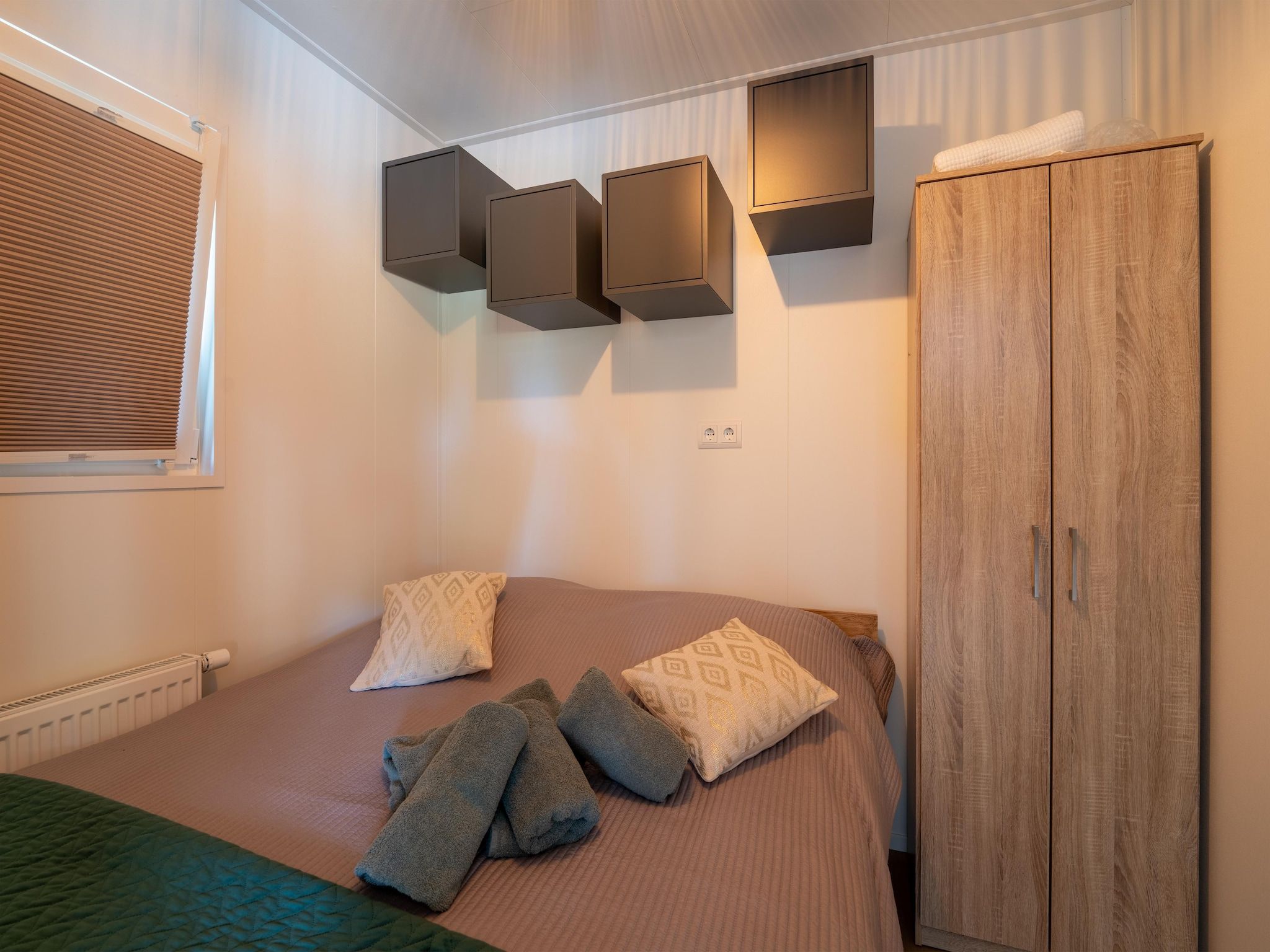Een slaapkamer van Lodge David in Hattemerbroek
