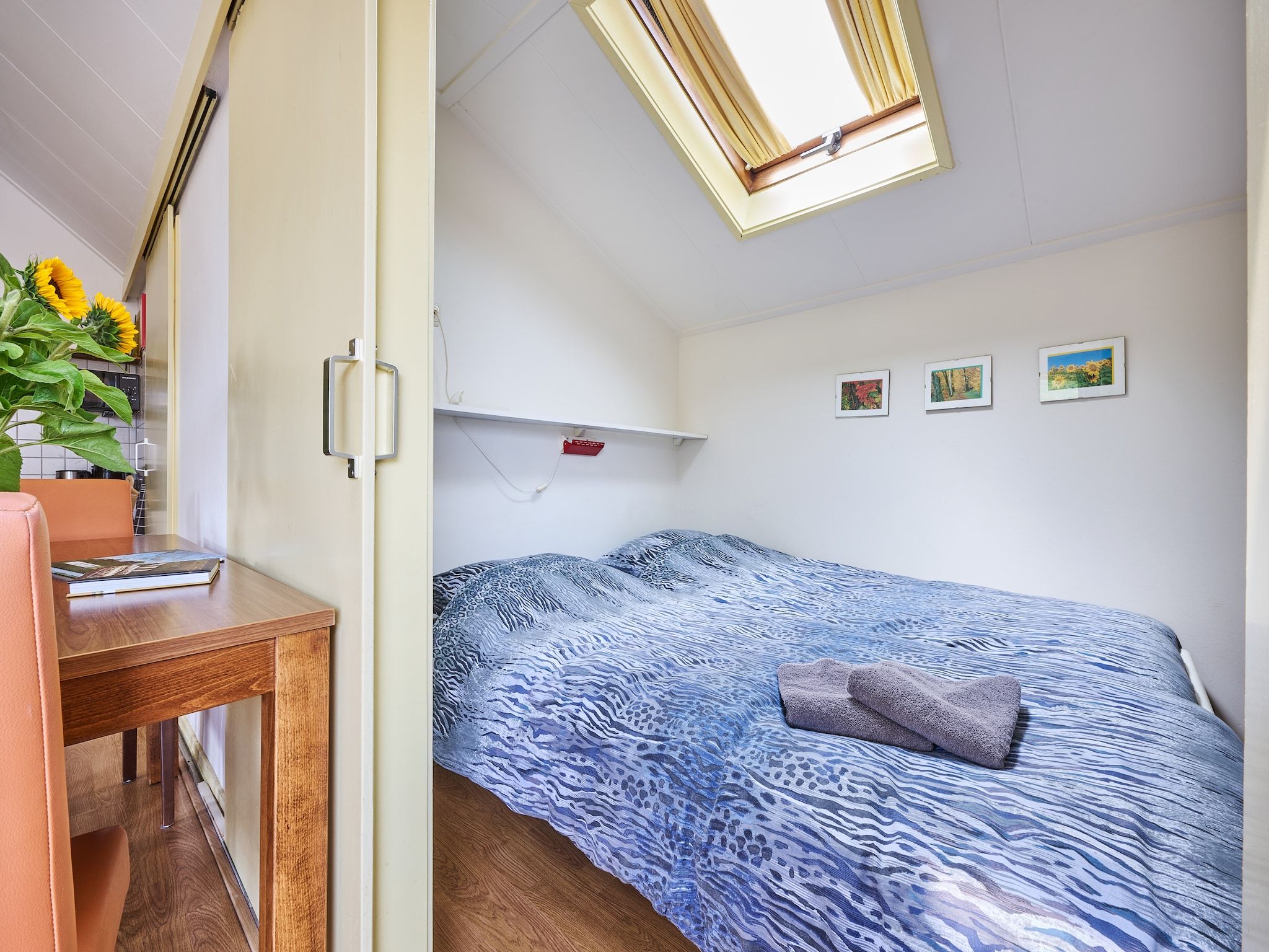 Een slaapkamer van De Riek 4P in De Kiel