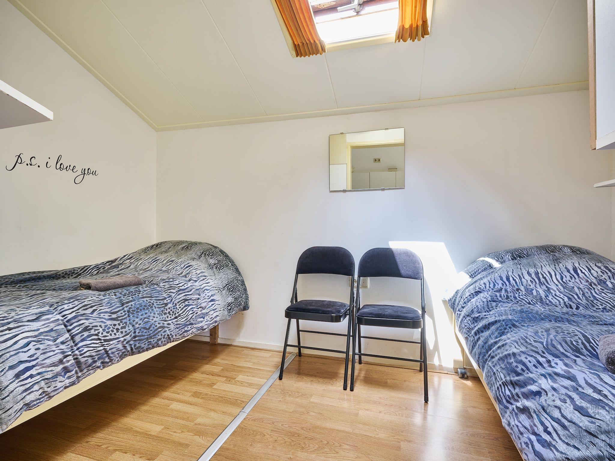 Een slaapkamer van De Riek 4P in De Kiel