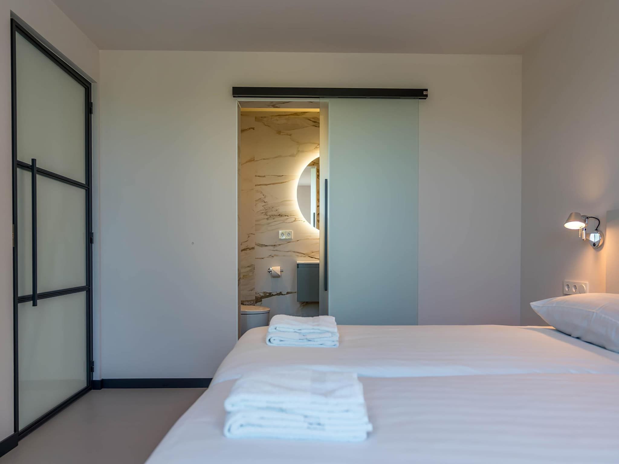 Een slaapkamer van ’t Waddenstrandje in Oudeschild