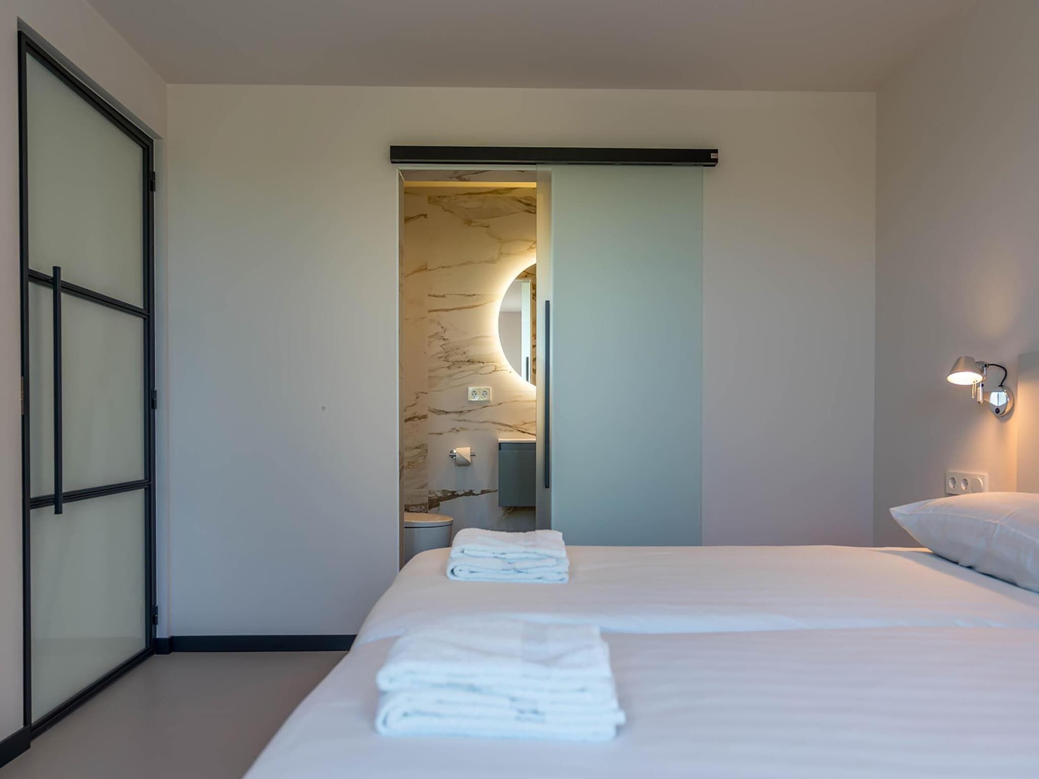 Een slaapkamer van ’t Waddenstrandje in Oudeschild