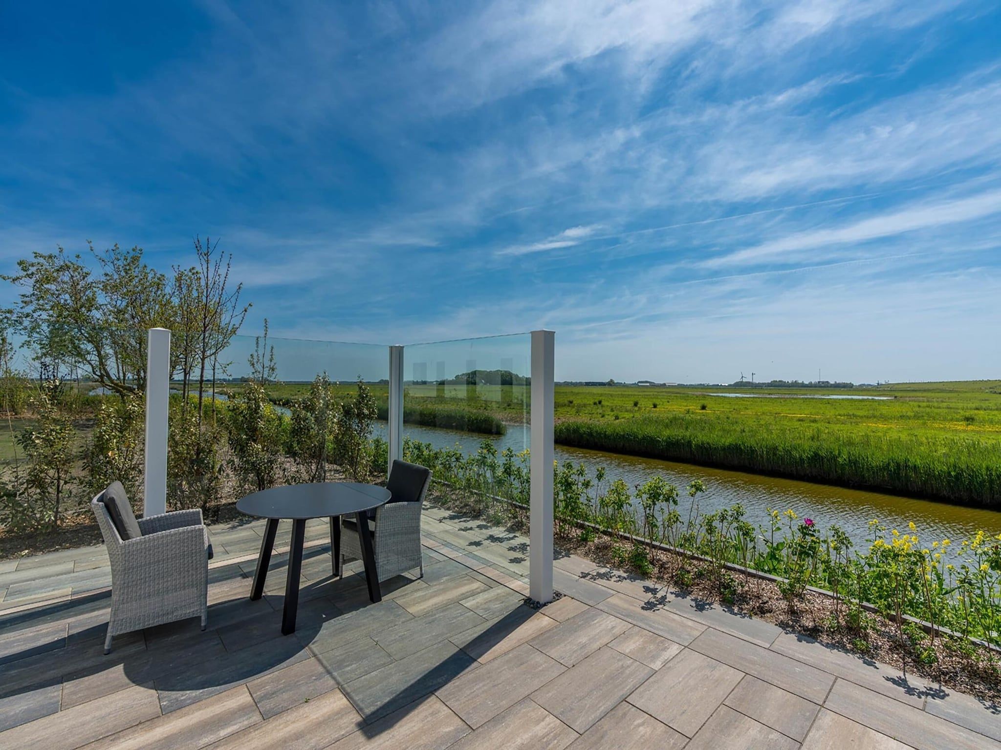 Het uitzicht vanaf ’t Waddenstrandje in Oudeschild