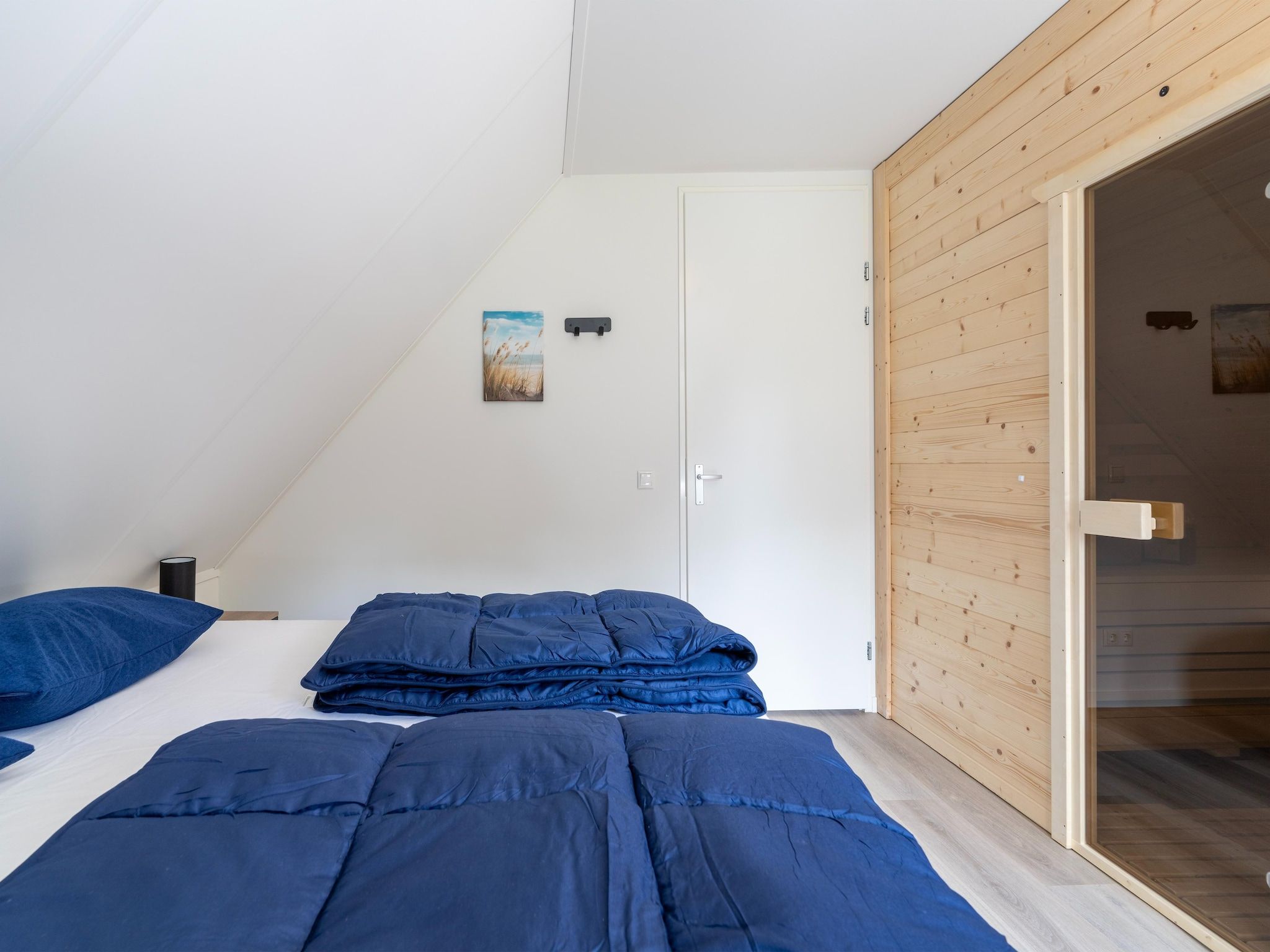 Een slaapkamer van Kuifduiker 5 in Simonshaven