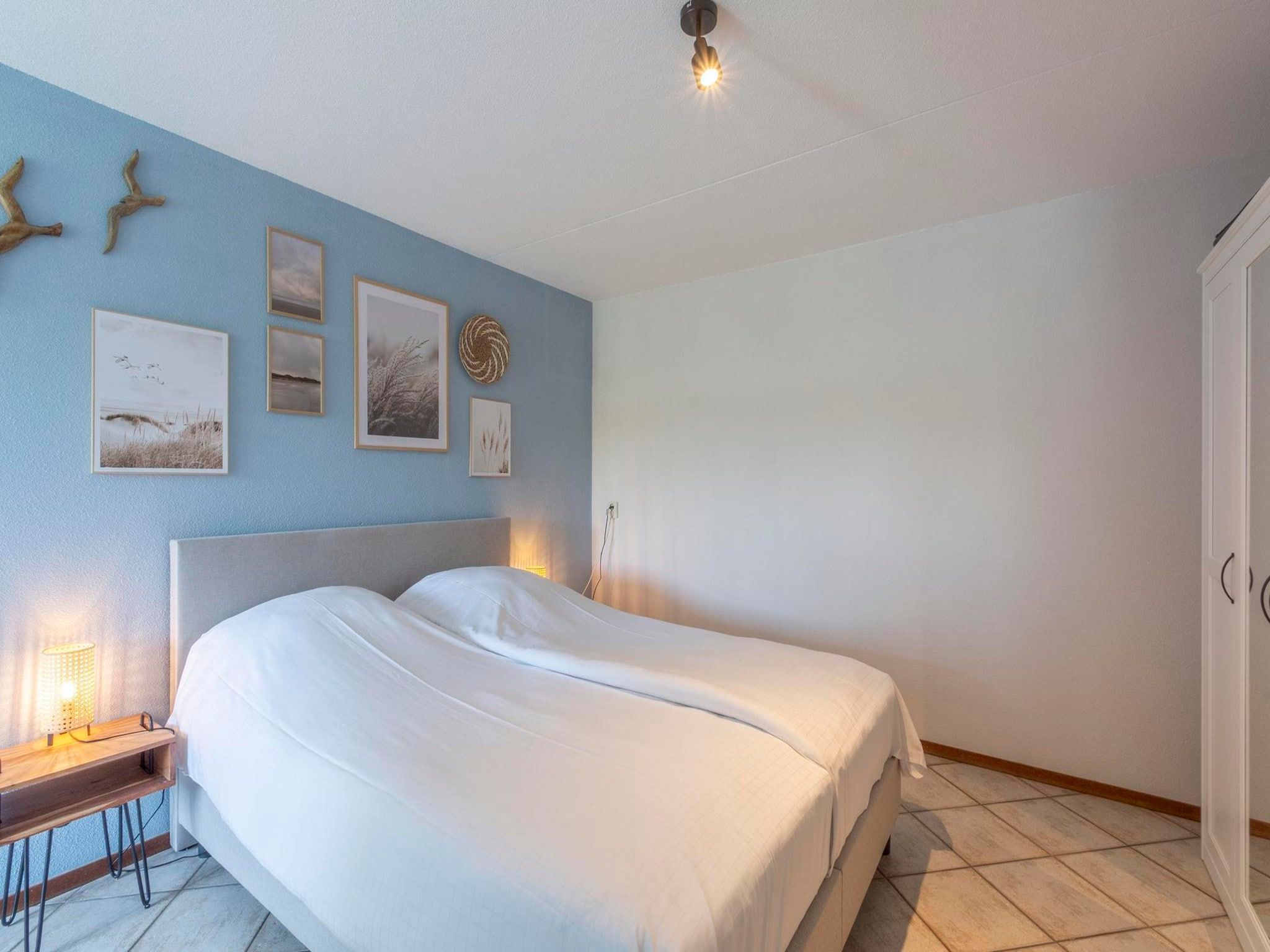Een slaapkamer van Wijde Blick 310 in Callantsoog