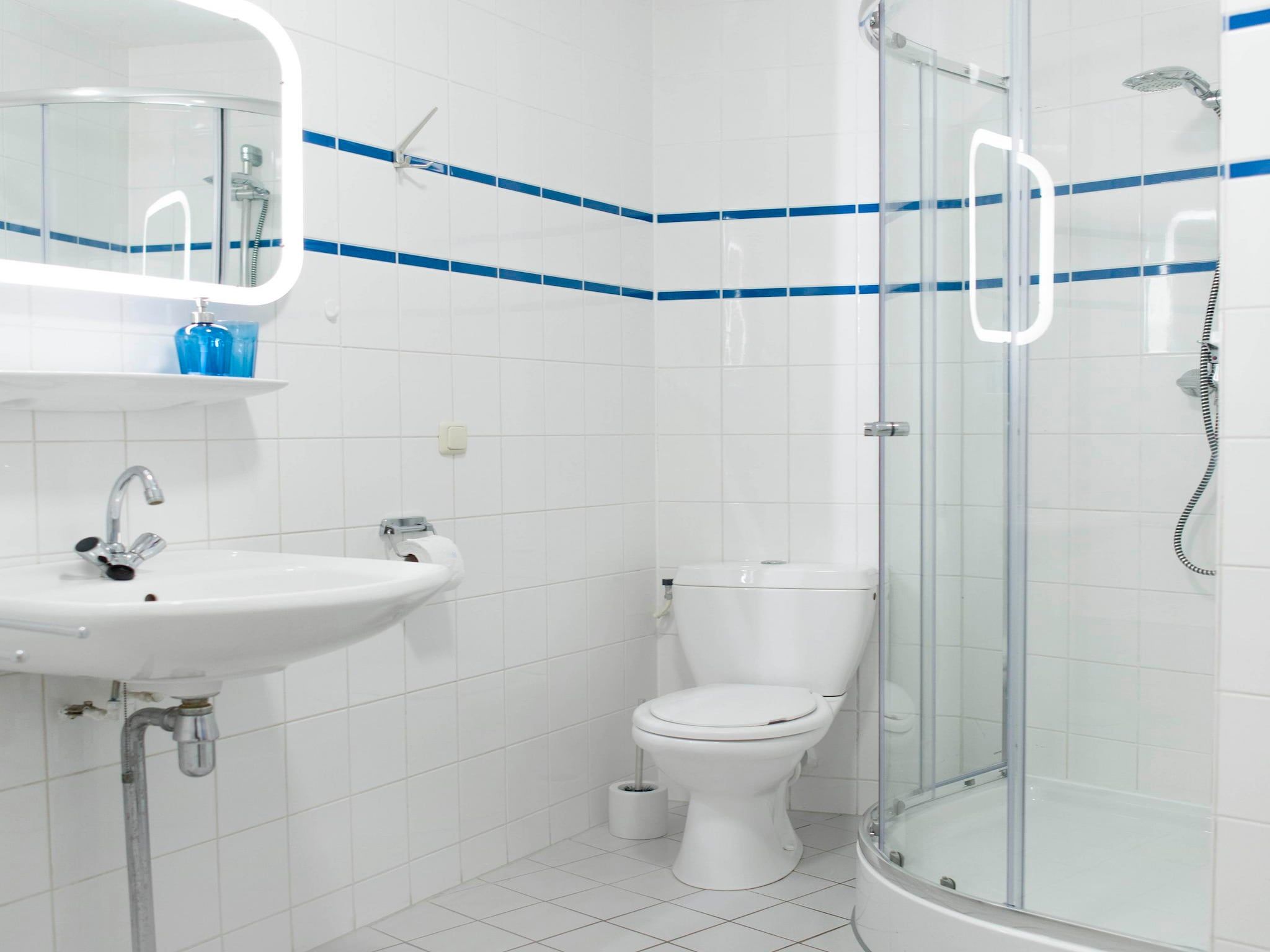 De badkamer van Résidence Juliana 14 in Julianadorp aan Zee