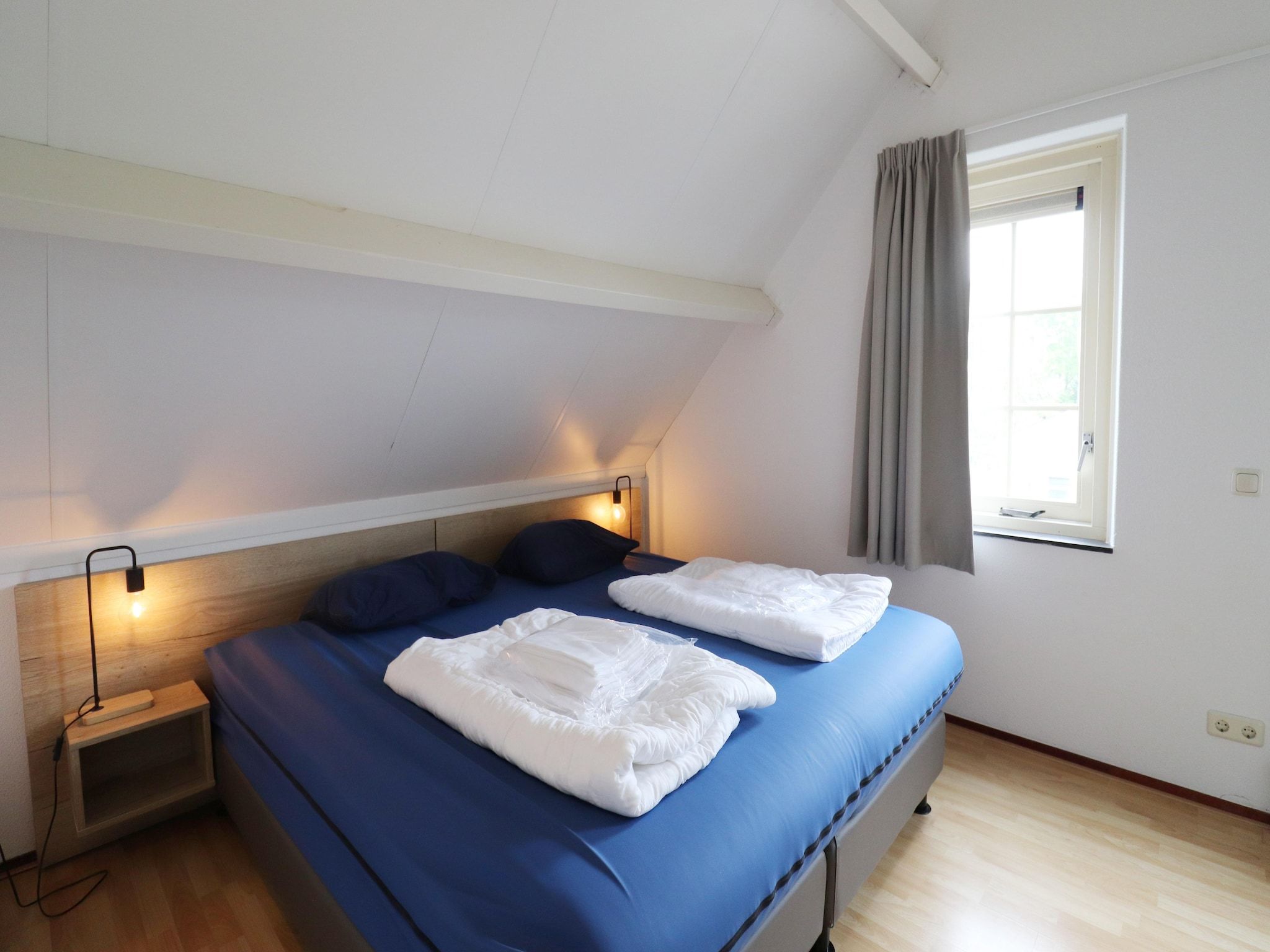 Een slaapkamer van Standaard 24 in Simonshaven