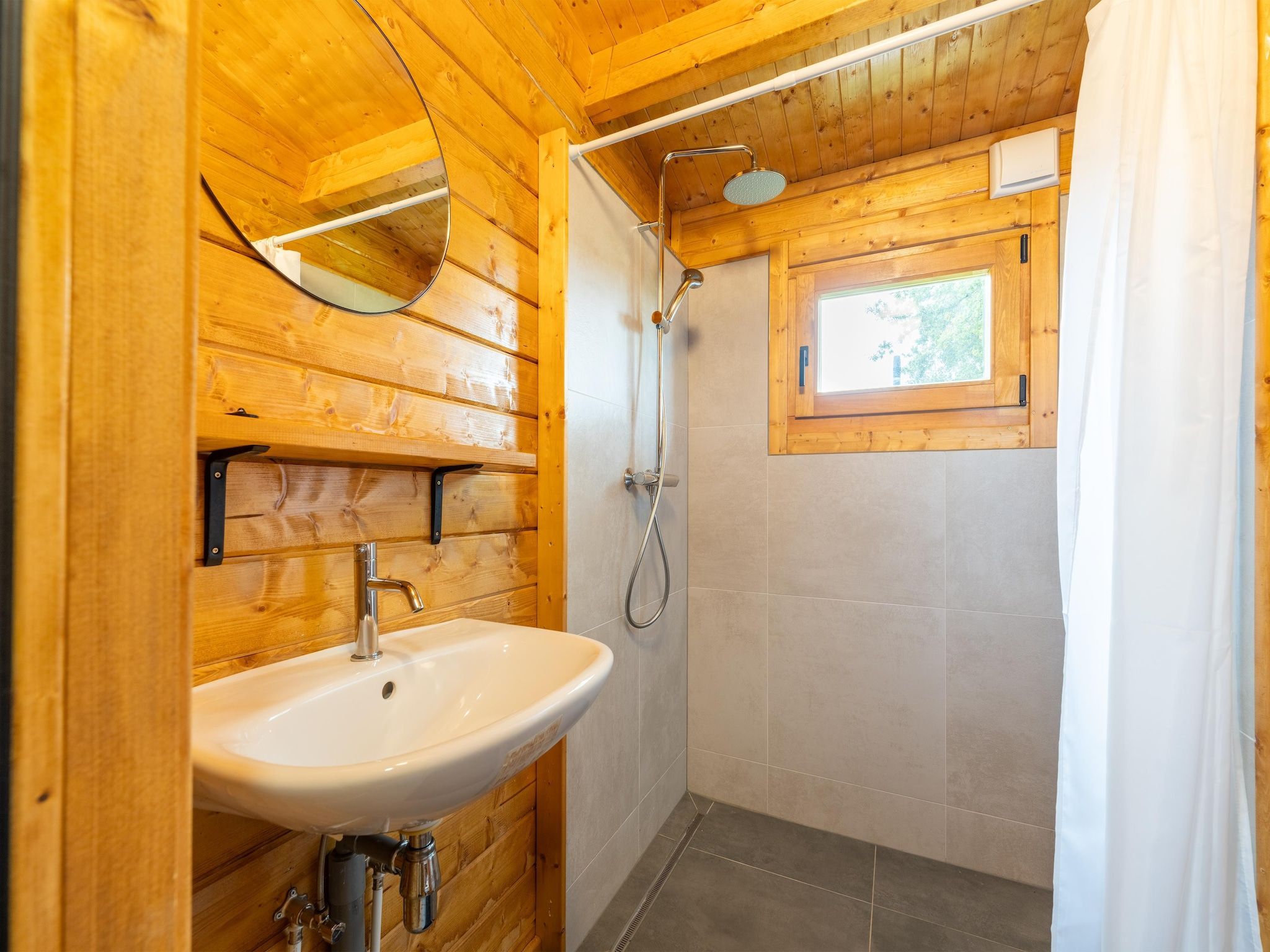 De badkamer van Chalet Riga in Valkenswaard