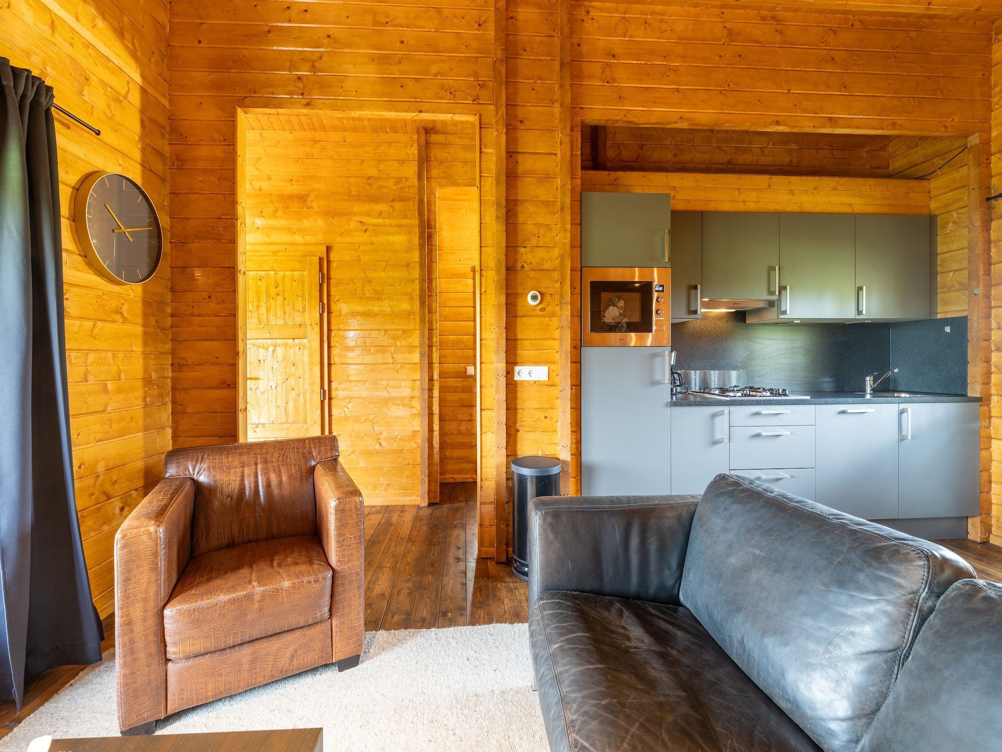 De woonkamer van Chalet Riga in Valkenswaard