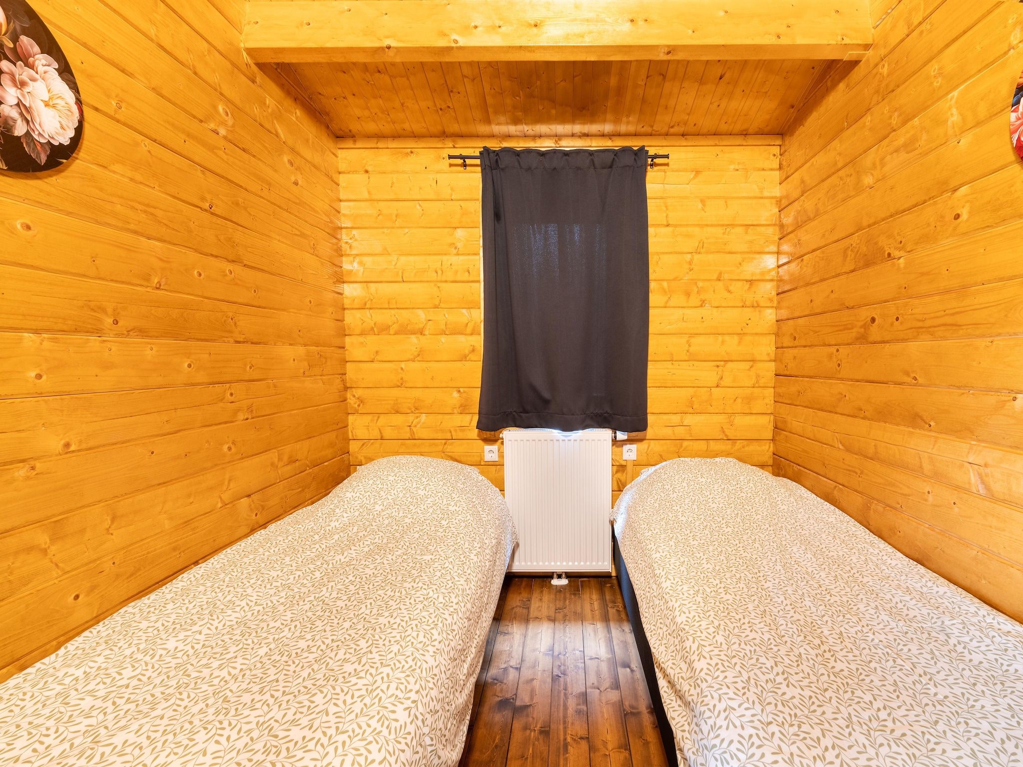 Een slaapkamer van Chalet Riga in Valkenswaard