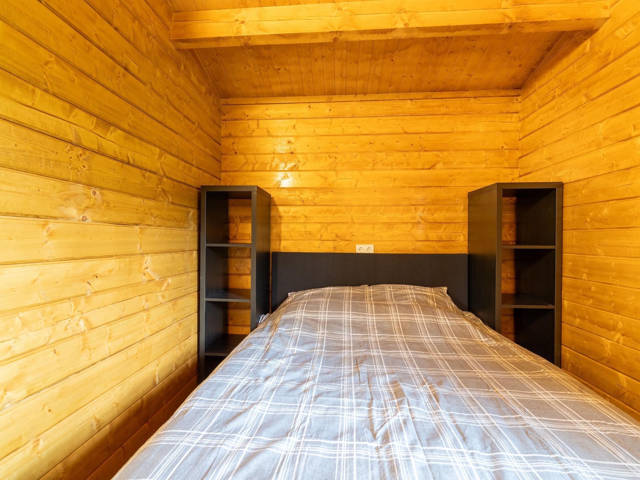 Een slaapkamer van Chalet Riga in Valkenswaard