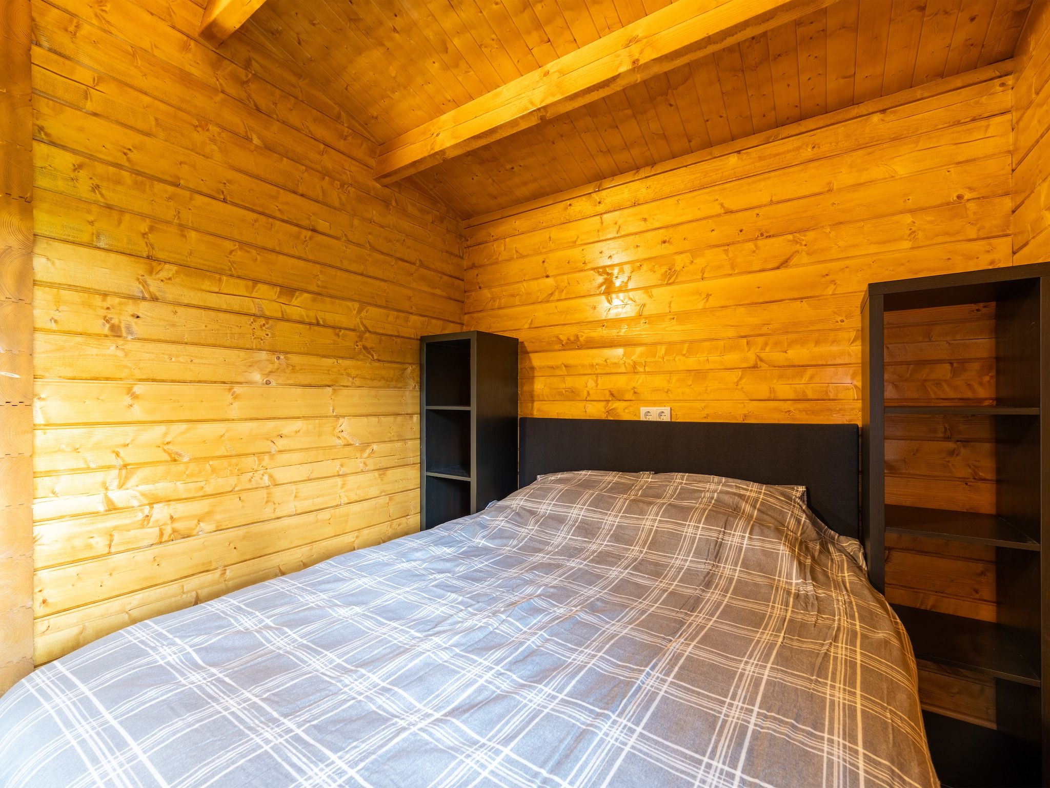 Een slaapkamer van Chalet Riga in Valkenswaard