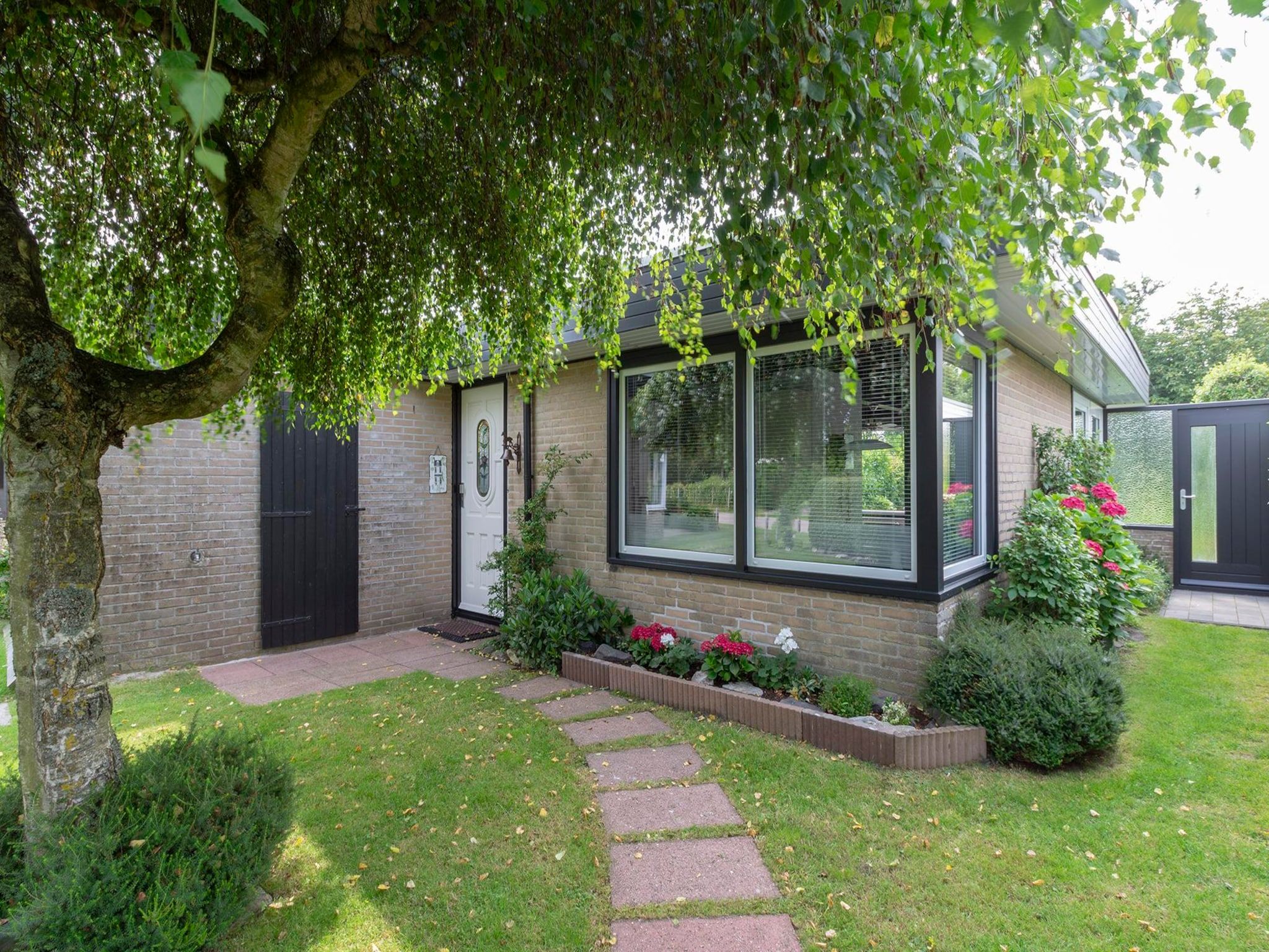 De tuin van Duinland 15 in Sint Maartenszee