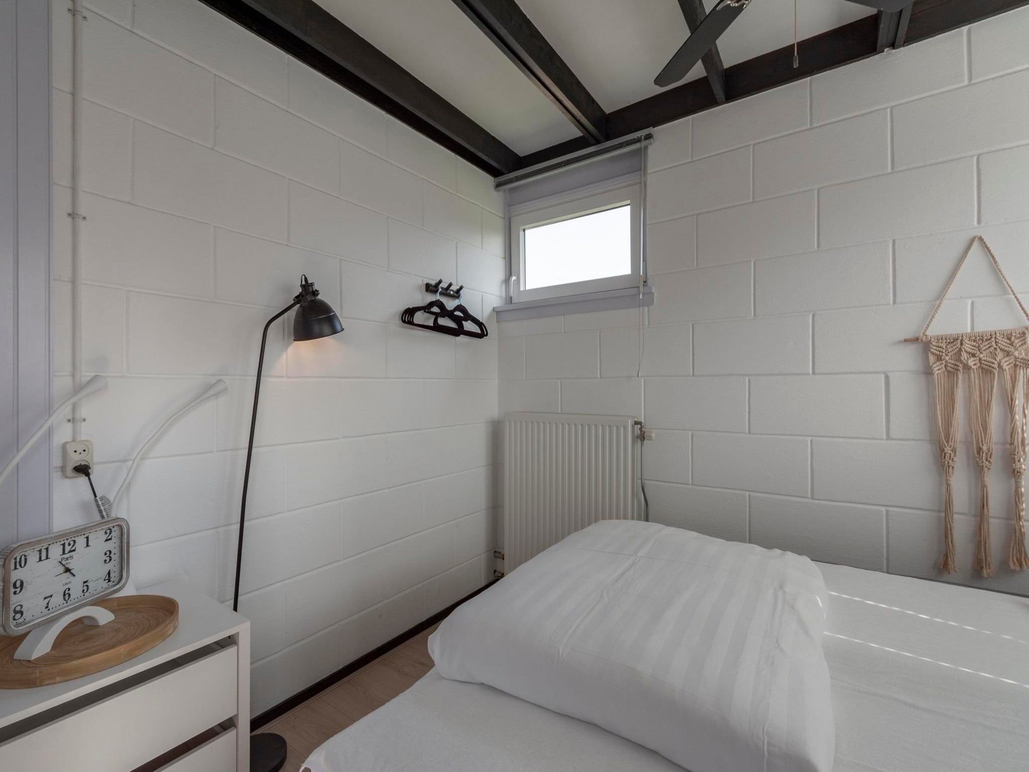 Een slaapkamer van Duinland 15 in Sint Maartenszee