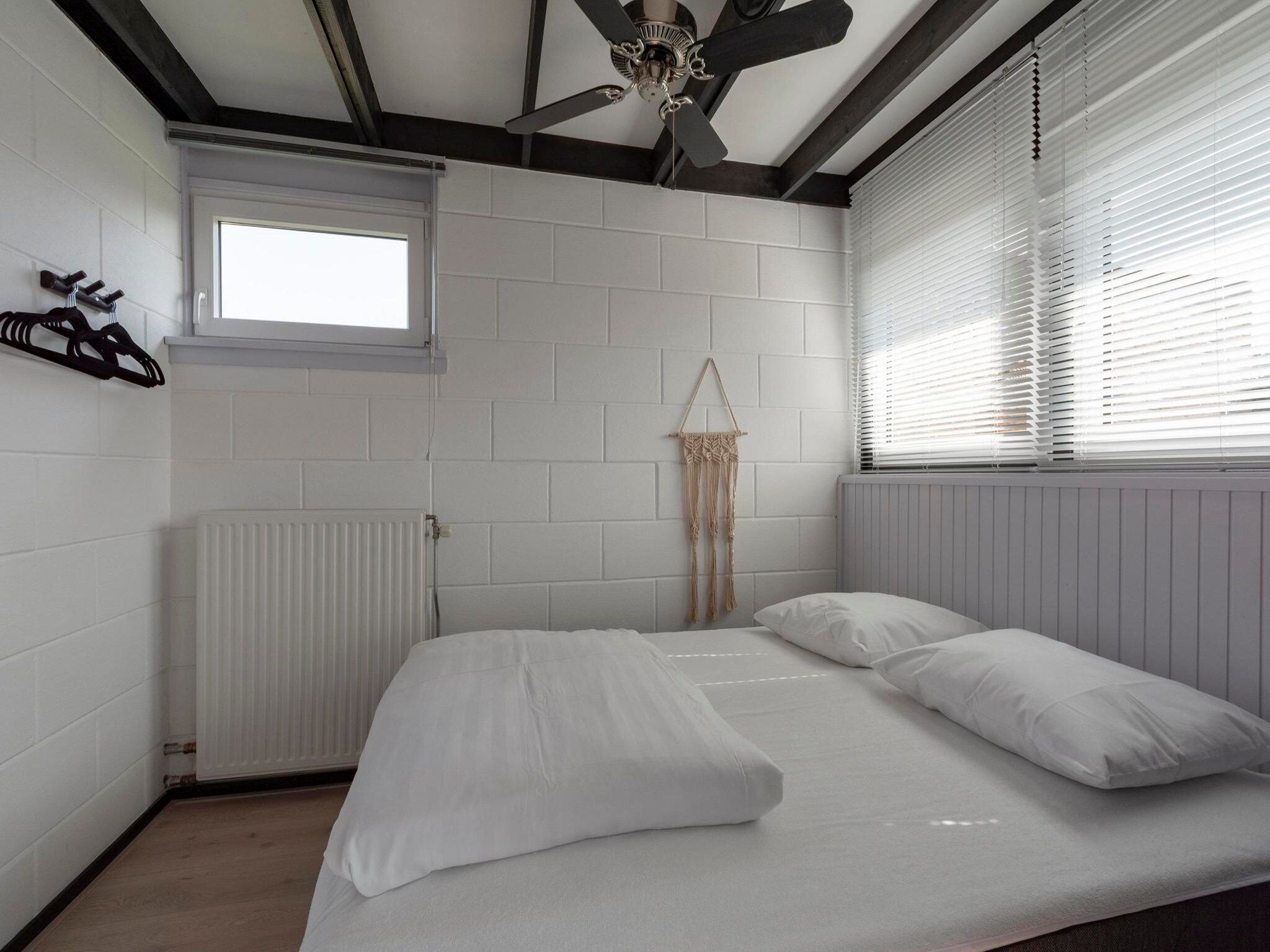 Een slaapkamer van Duinland 15 in Sint Maartenszee