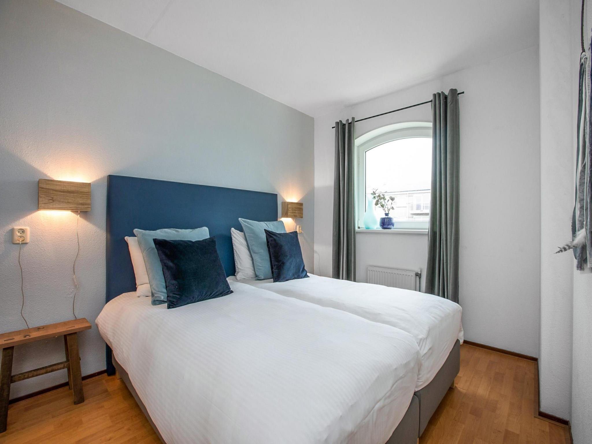 Een slaapkamer van Résidence Juliana 40 in Julianadorp aan Zee