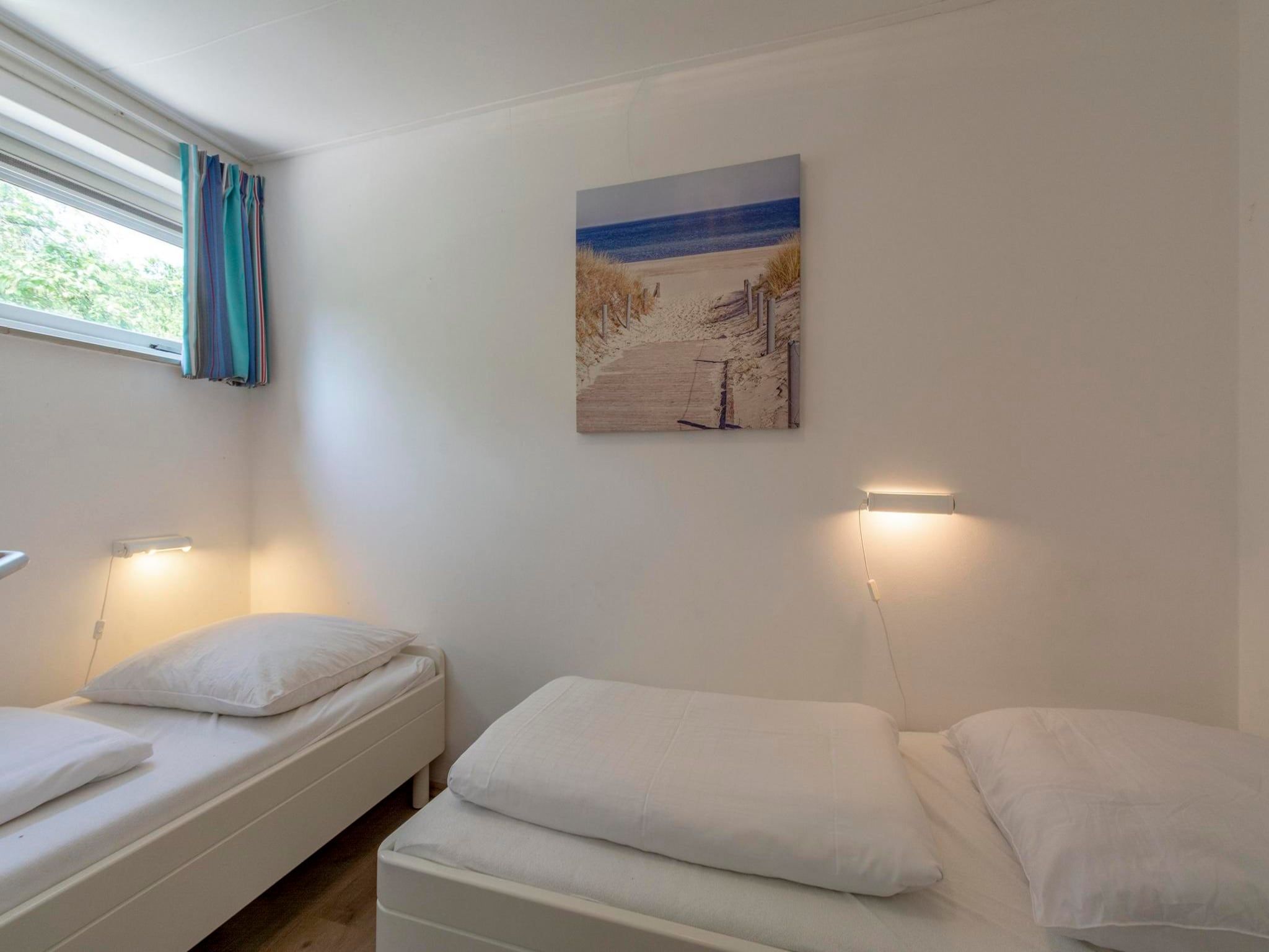 Een slaapkamer van Duinland 190 in Sint Maartenszee