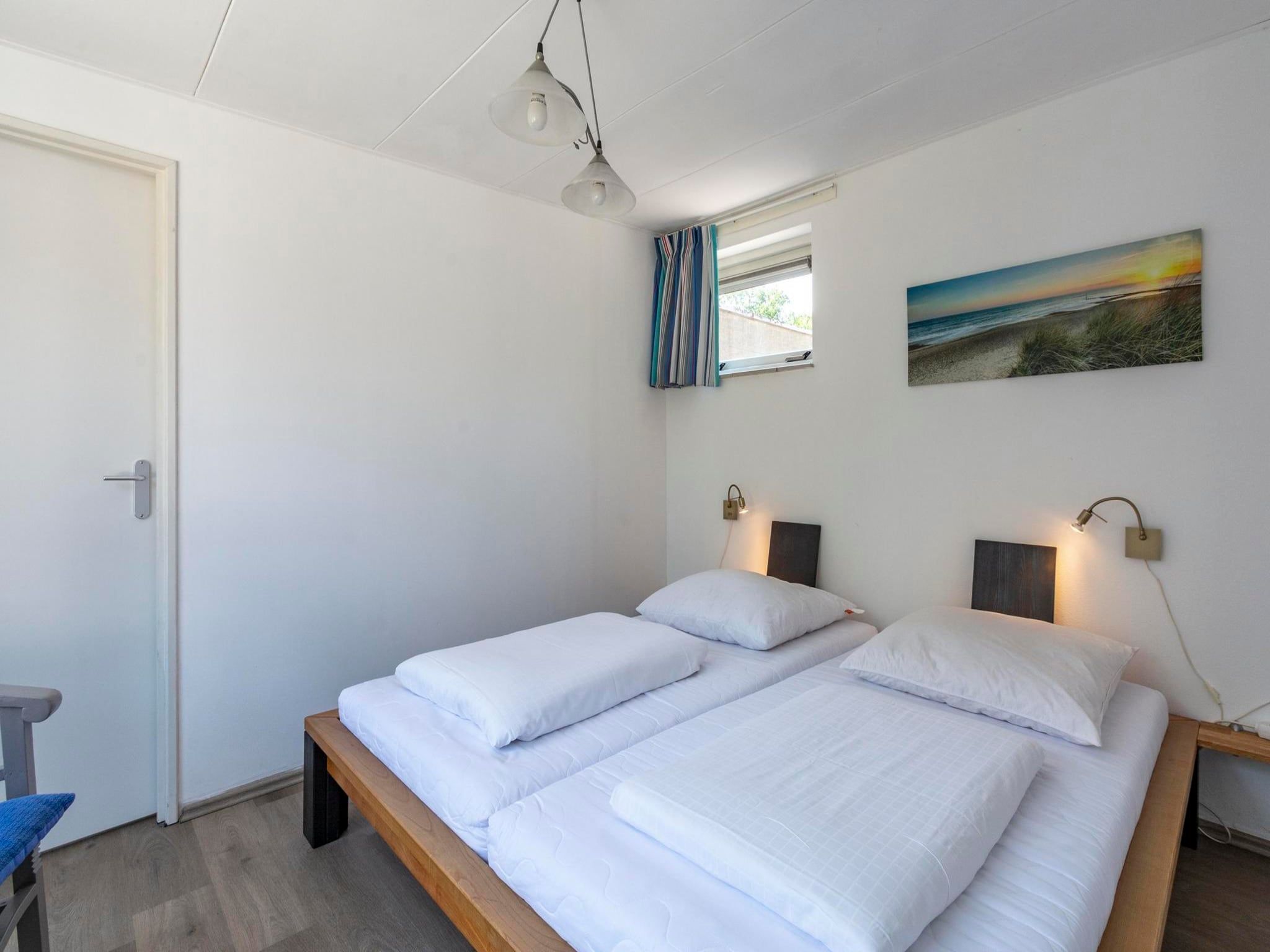 Een slaapkamer van Duinland 190 in Sint Maartenszee