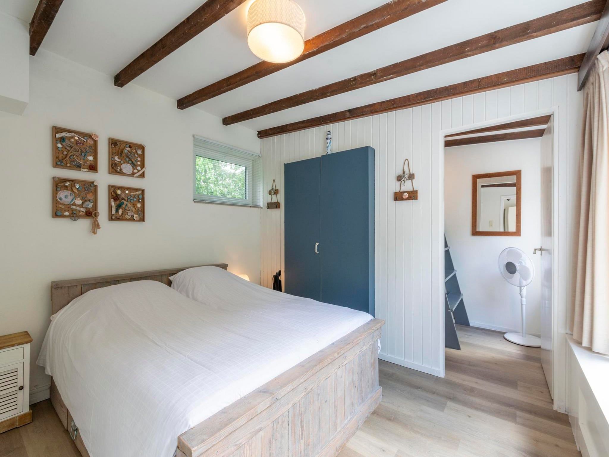 Een slaapkamer van Duinland 197 in Sint Maartenszee