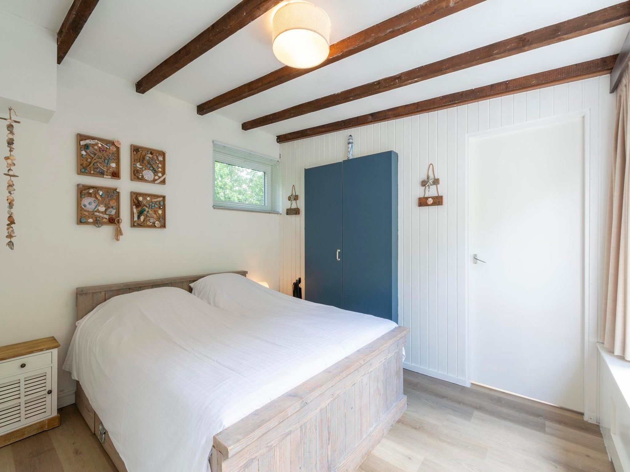 Een slaapkamer van Duinland 197 in Sint Maartenszee