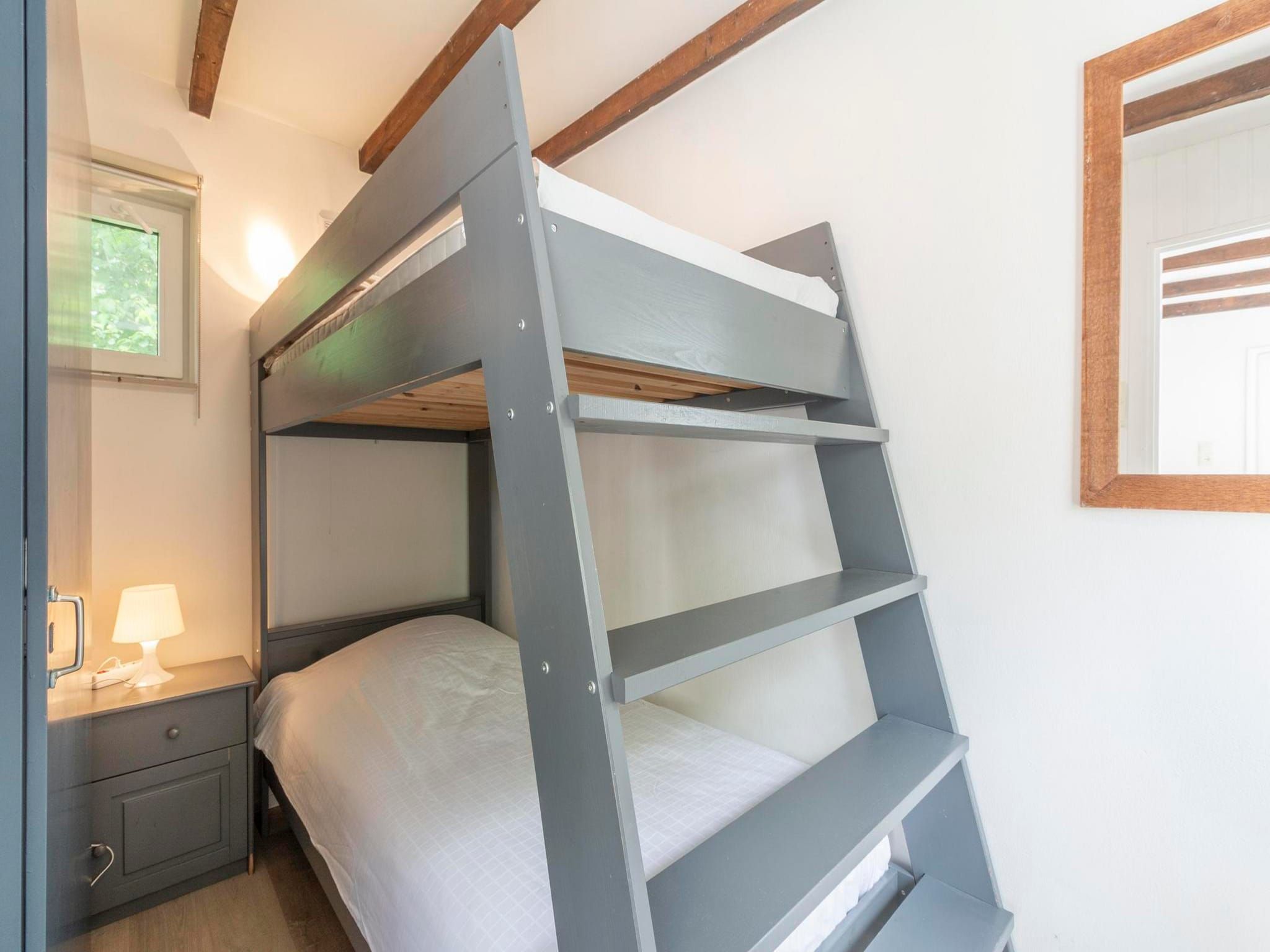 Een slaapkamer van Duinland 197 in Sint Maartenszee