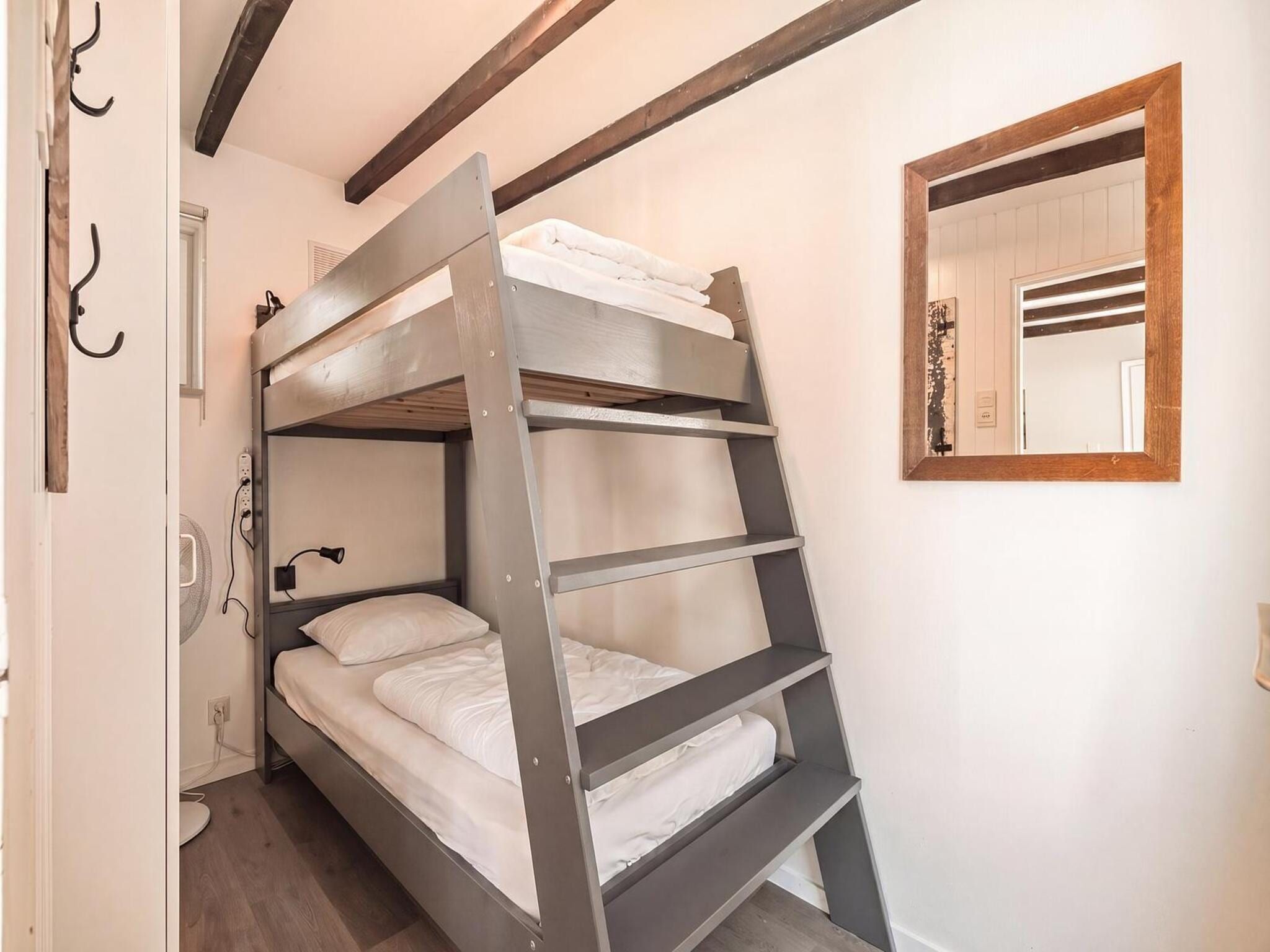 Een slaapkamer van Duinland 197 in Sint Maartenszee