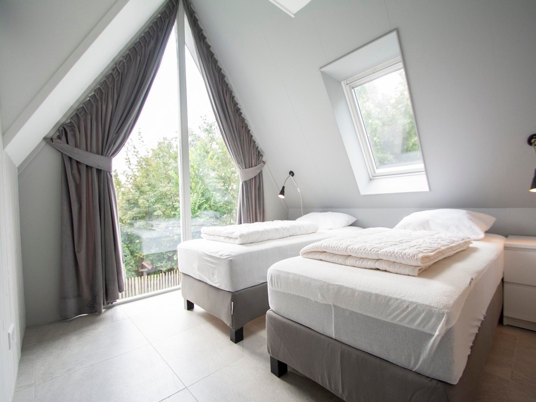 Een slaapkamer van Sandepark 171 in Callantsoog