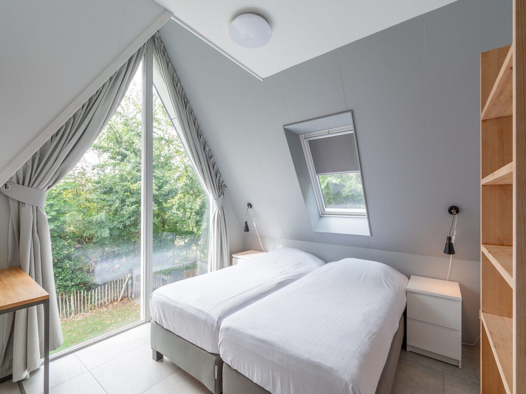 Een slaapkamer van Sandepark 171 in Callantsoog