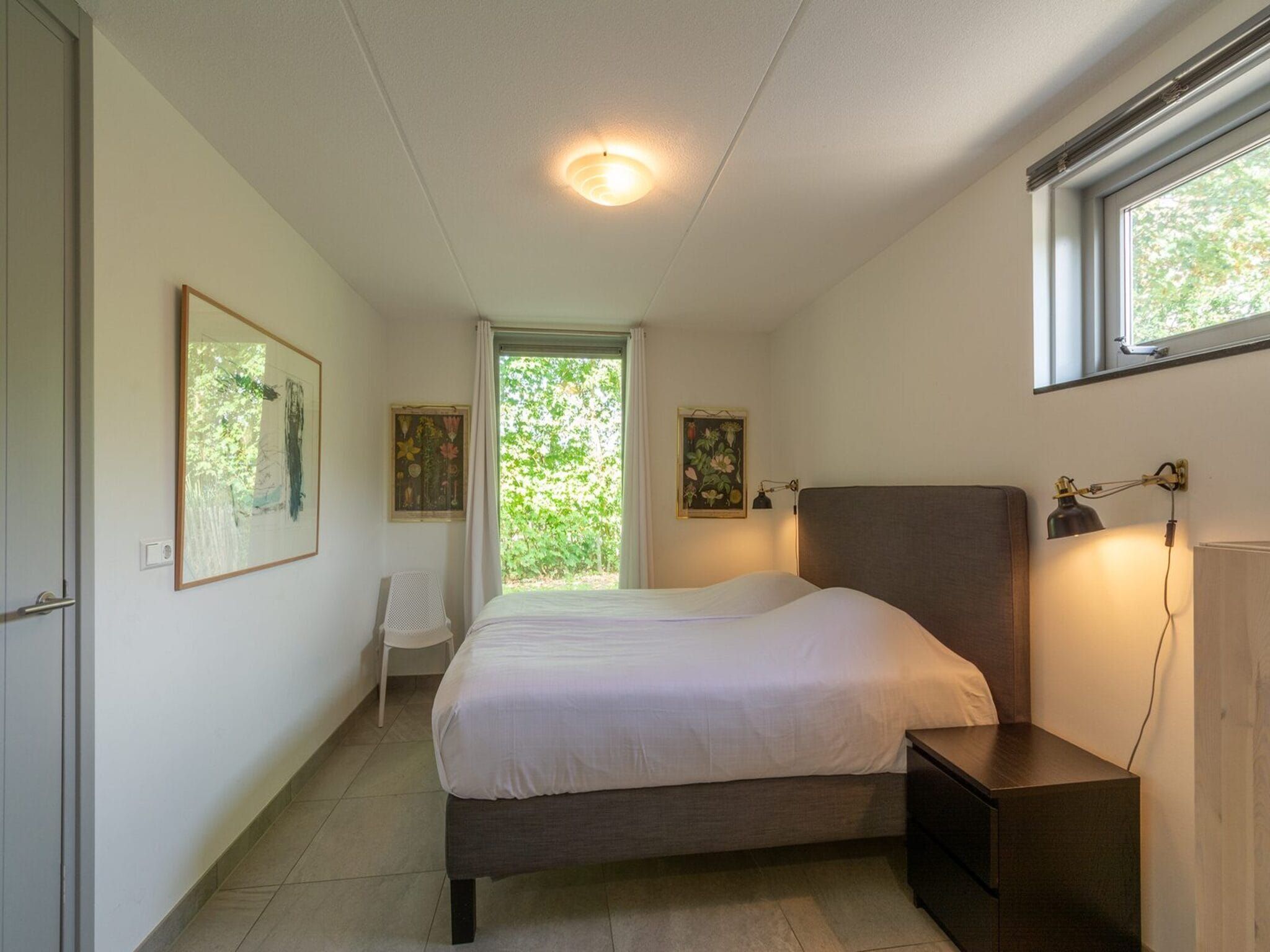 Een slaapkamer van Sandepark 171 in Callantsoog