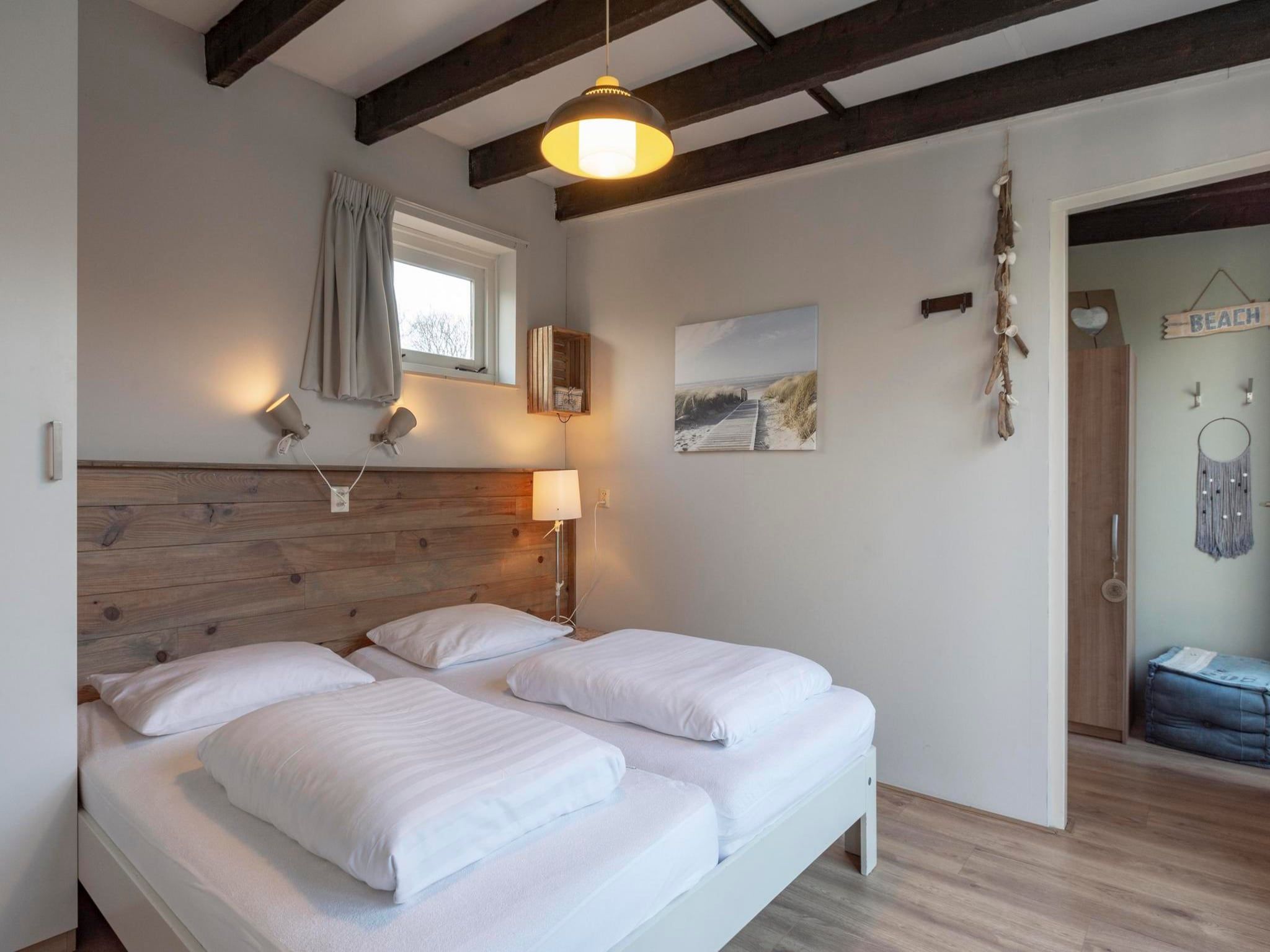 Een slaapkamer van Duinland 245 in Sint Maartenszee