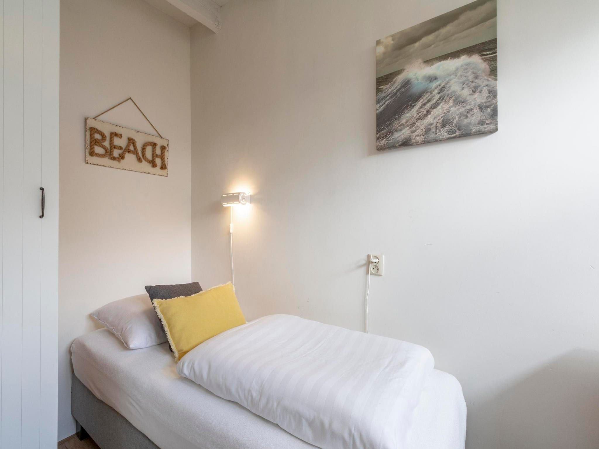 Een slaapkamer van Duinland 247 in Sint Maartenszee