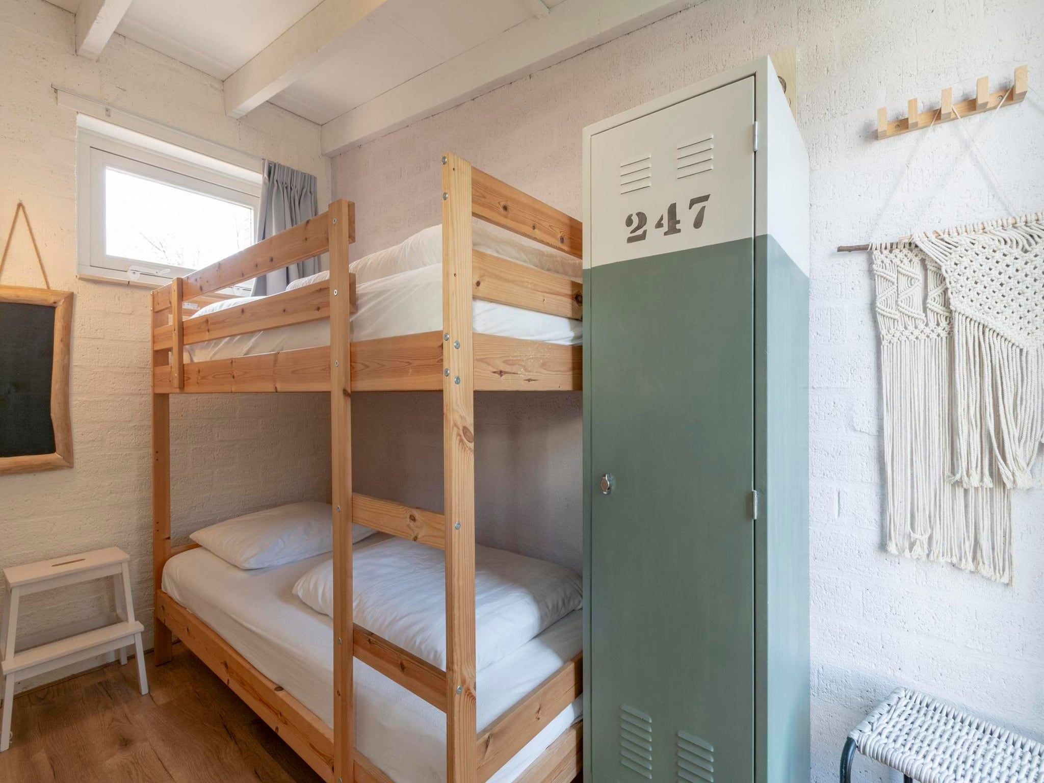 Een slaapkamer van Duinland 247 in Sint Maartenszee