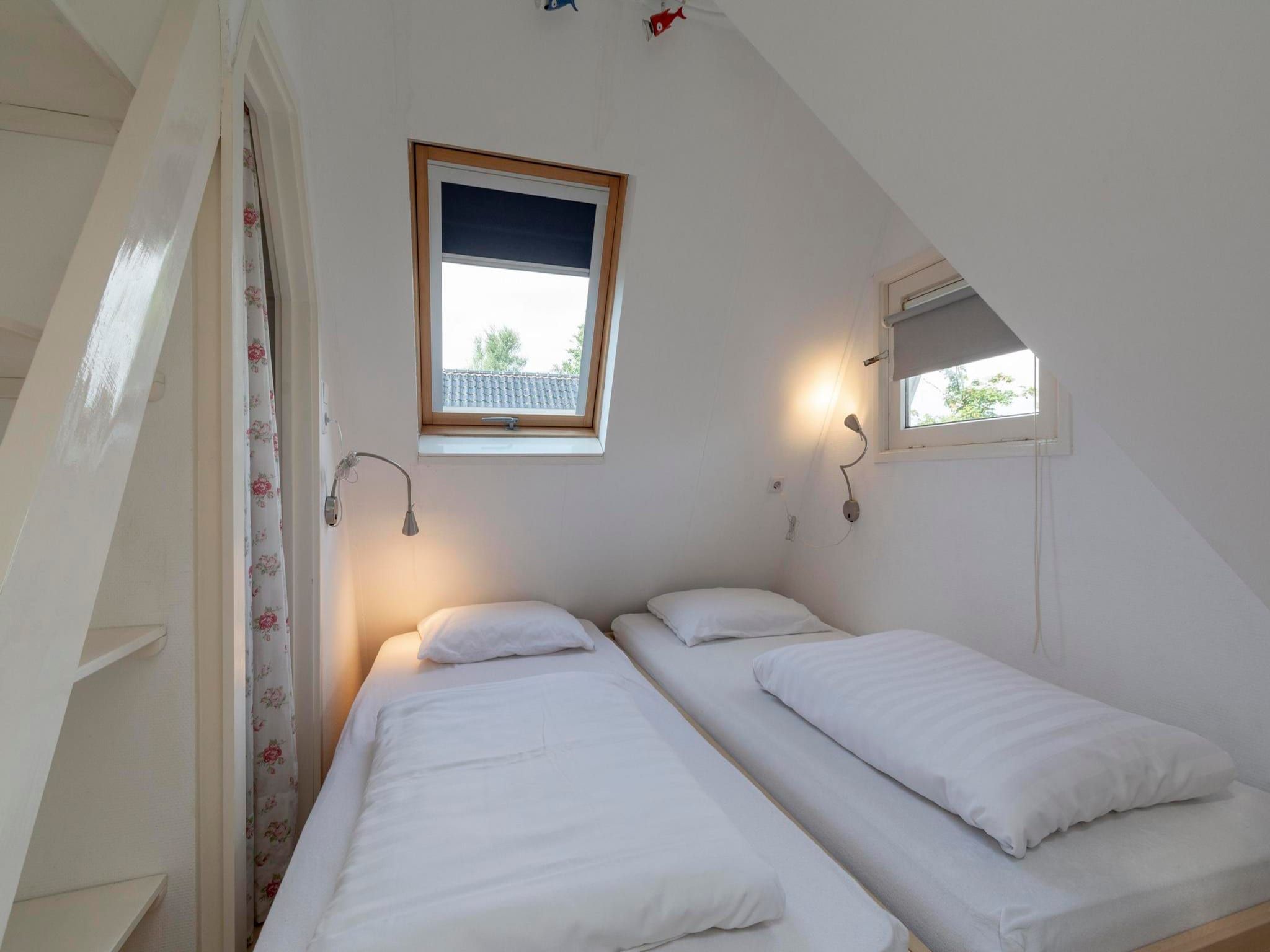 Een slaapkamer van Duinland 46 in Sint Maartenszee