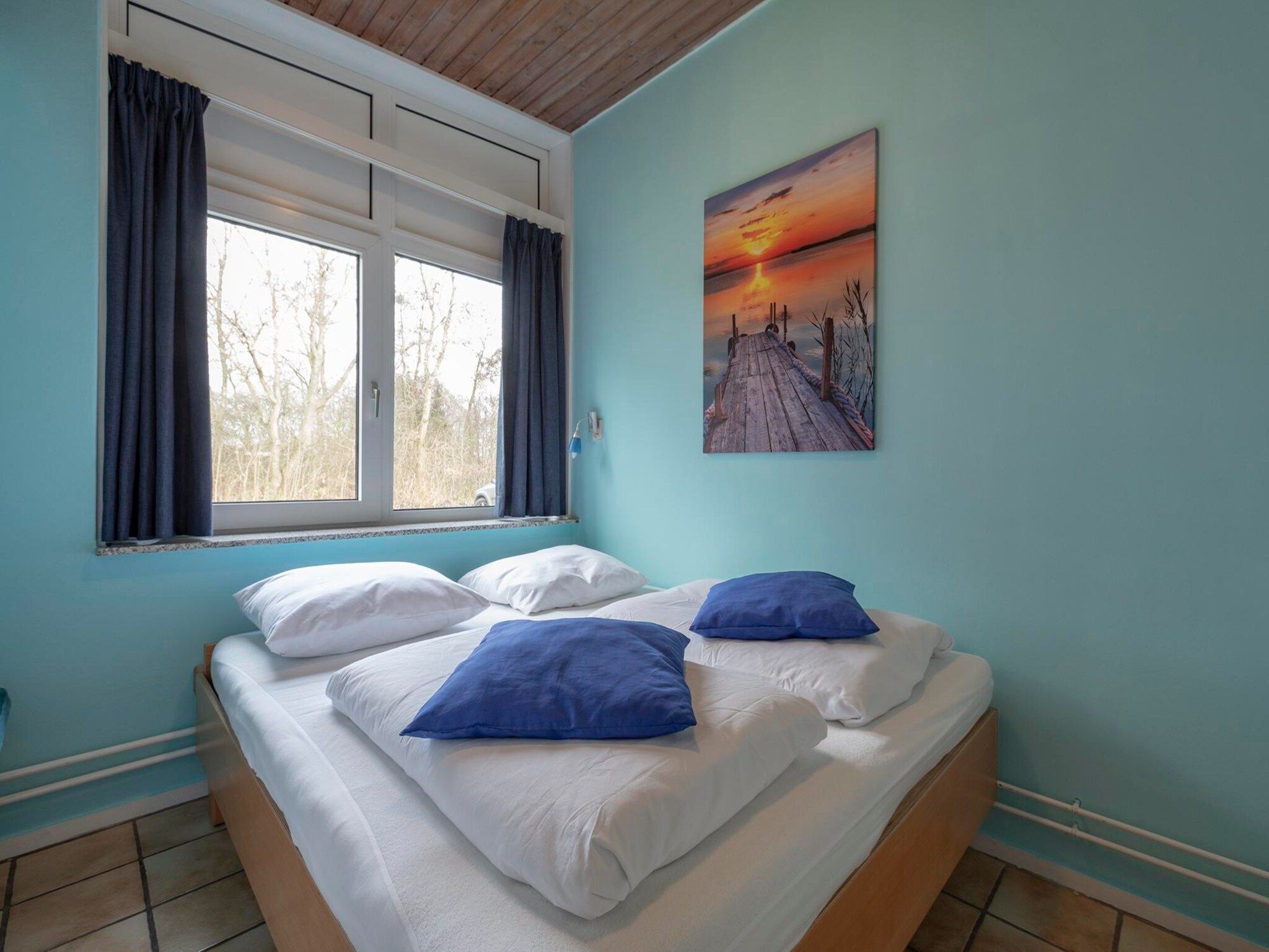 Een slaapkamer van Duinland 89 in Sint Maartenszee