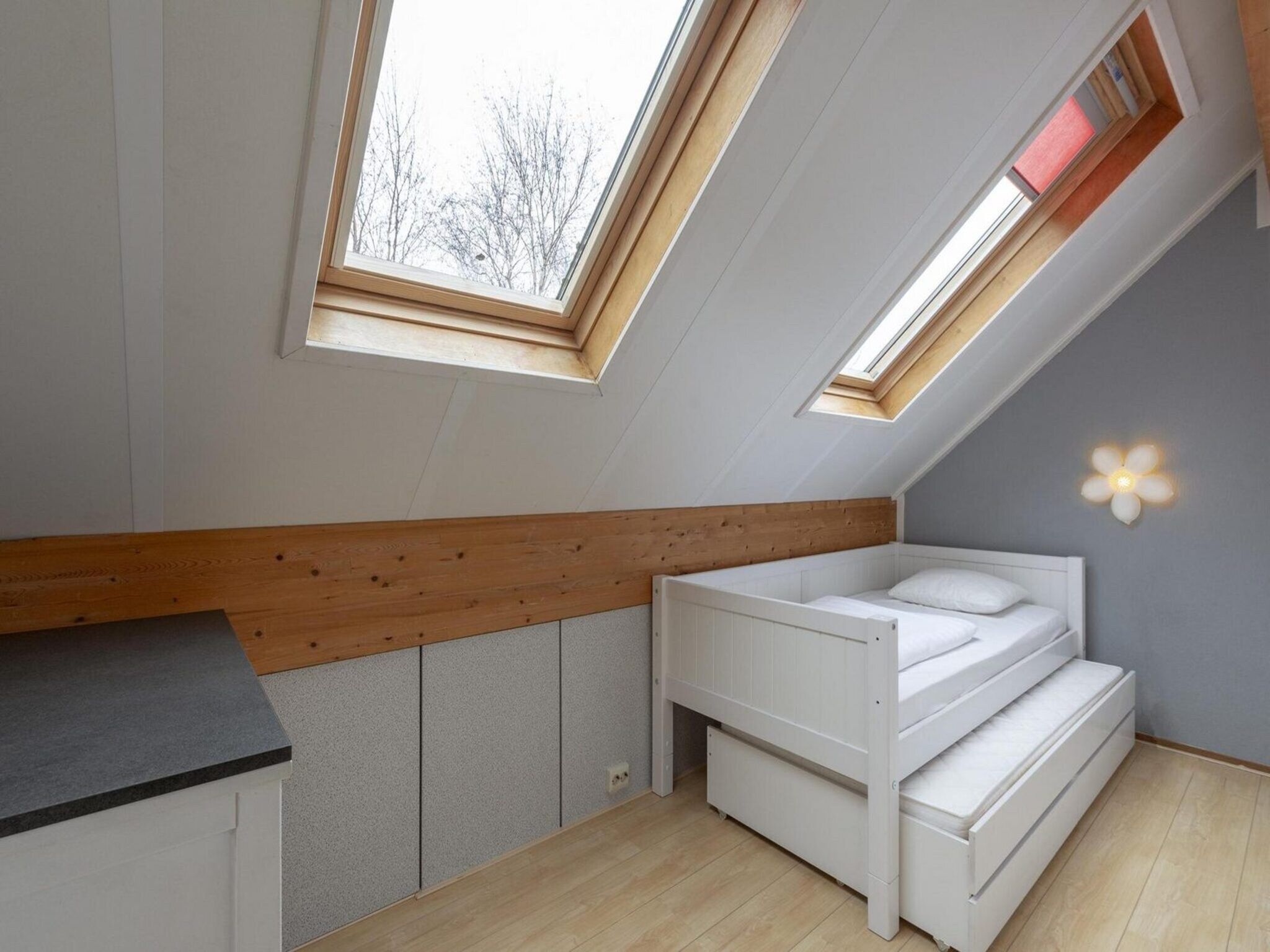 Een slaapkamer van Ooghduyne 75 in Julianadorp aan Zee