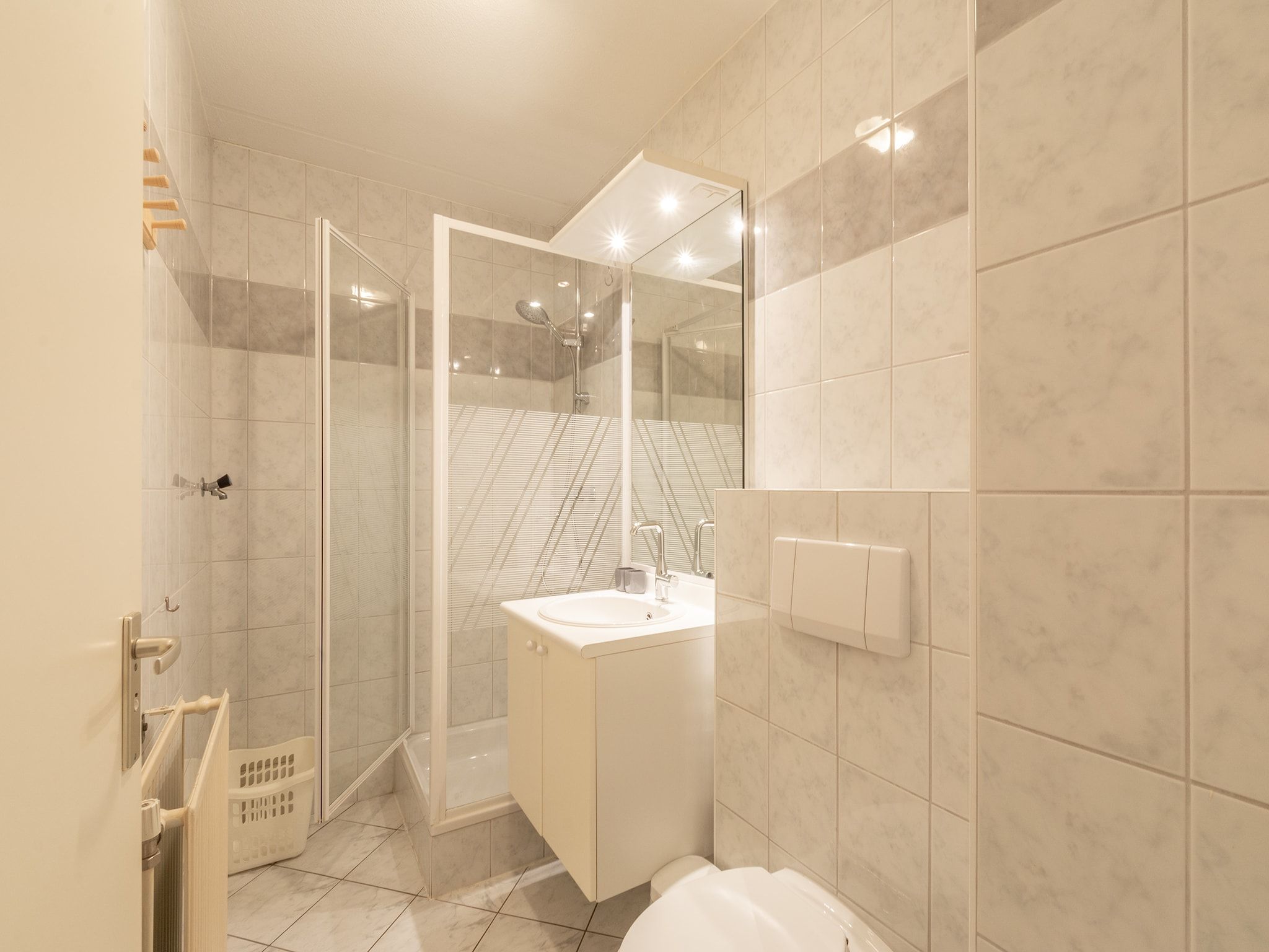 De badkamer van Strandslag 189 in Julianadorp aan Zee