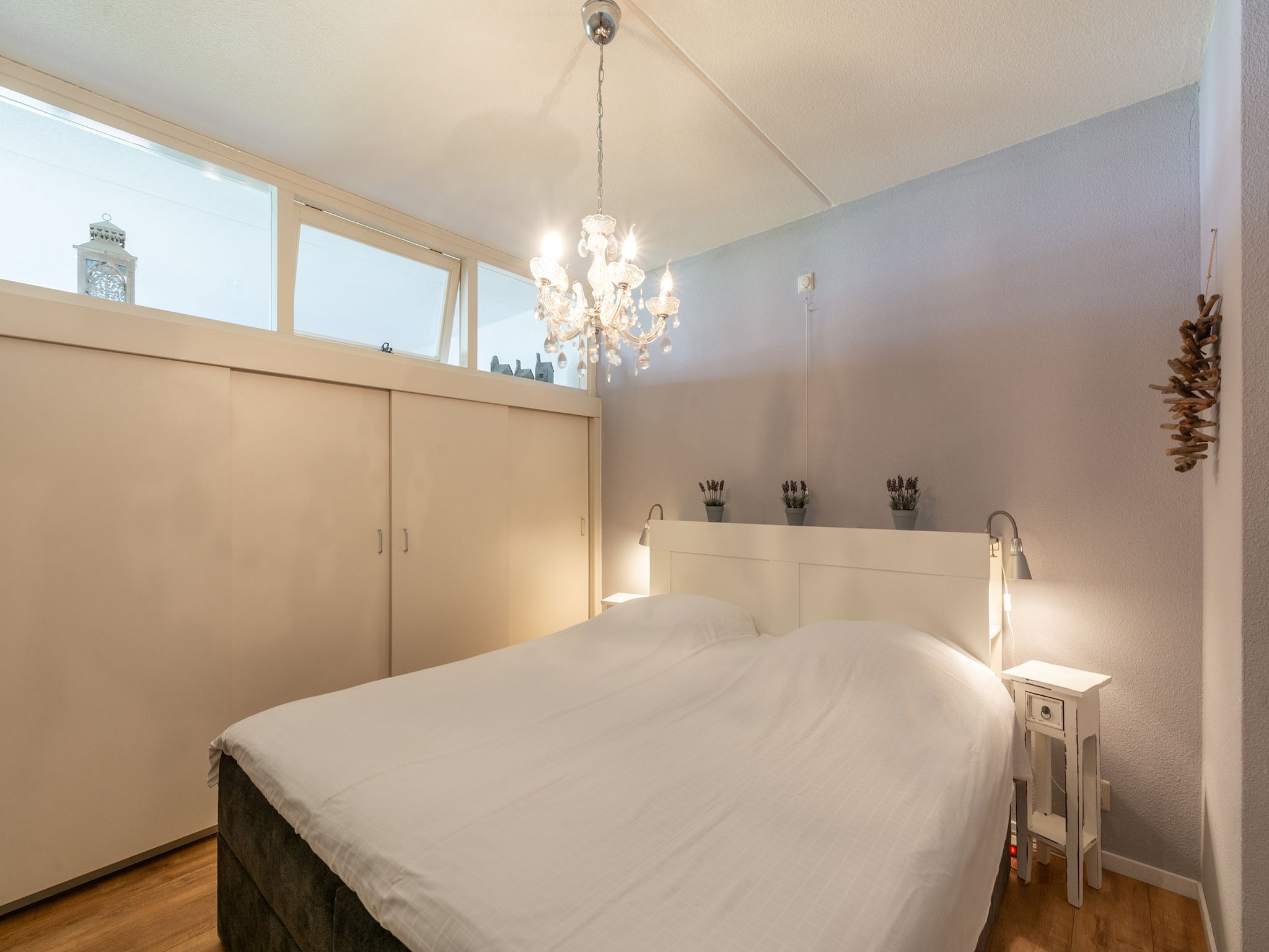 Een slaapkamer van Strandslag 193 in Julianadorp aan Zee