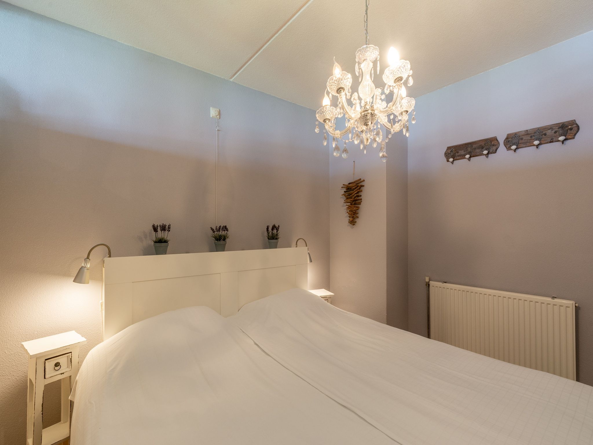 Een slaapkamer van Strandslag 193 in Julianadorp aan Zee