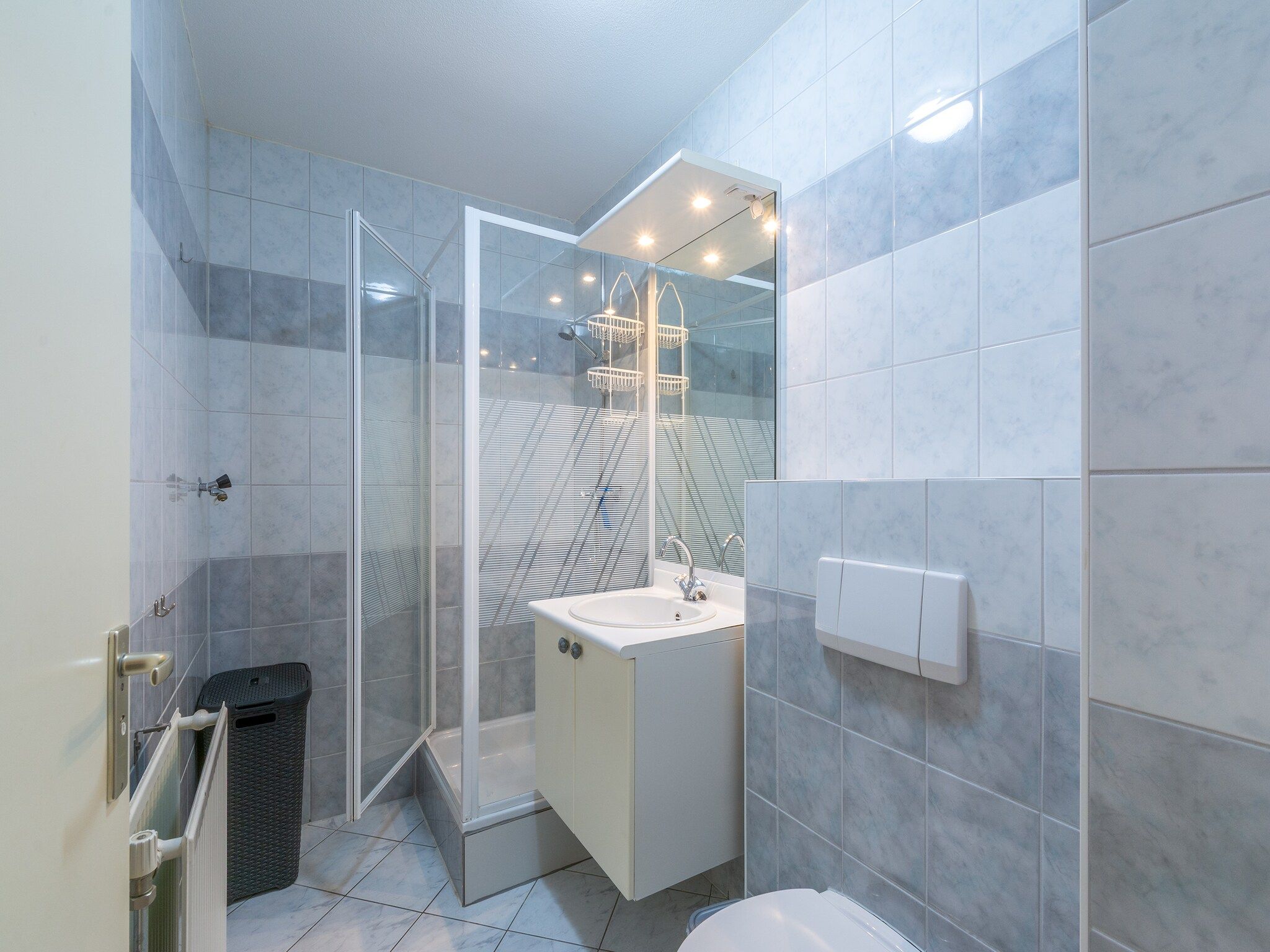 De badkamer van Strandslag 193 in Julianadorp aan Zee