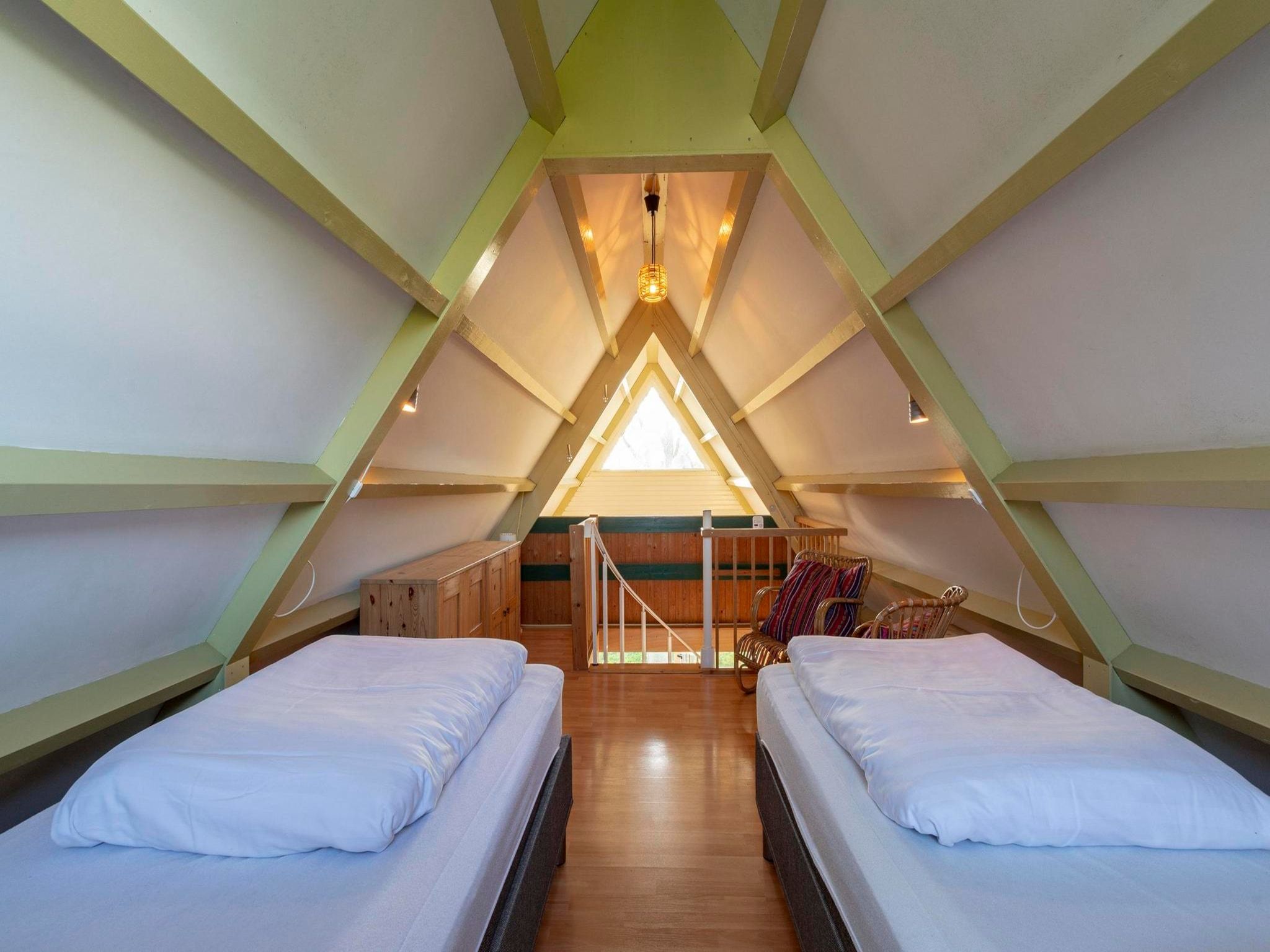 Een slaapkamer van Sandepark 93 in Callantsoog