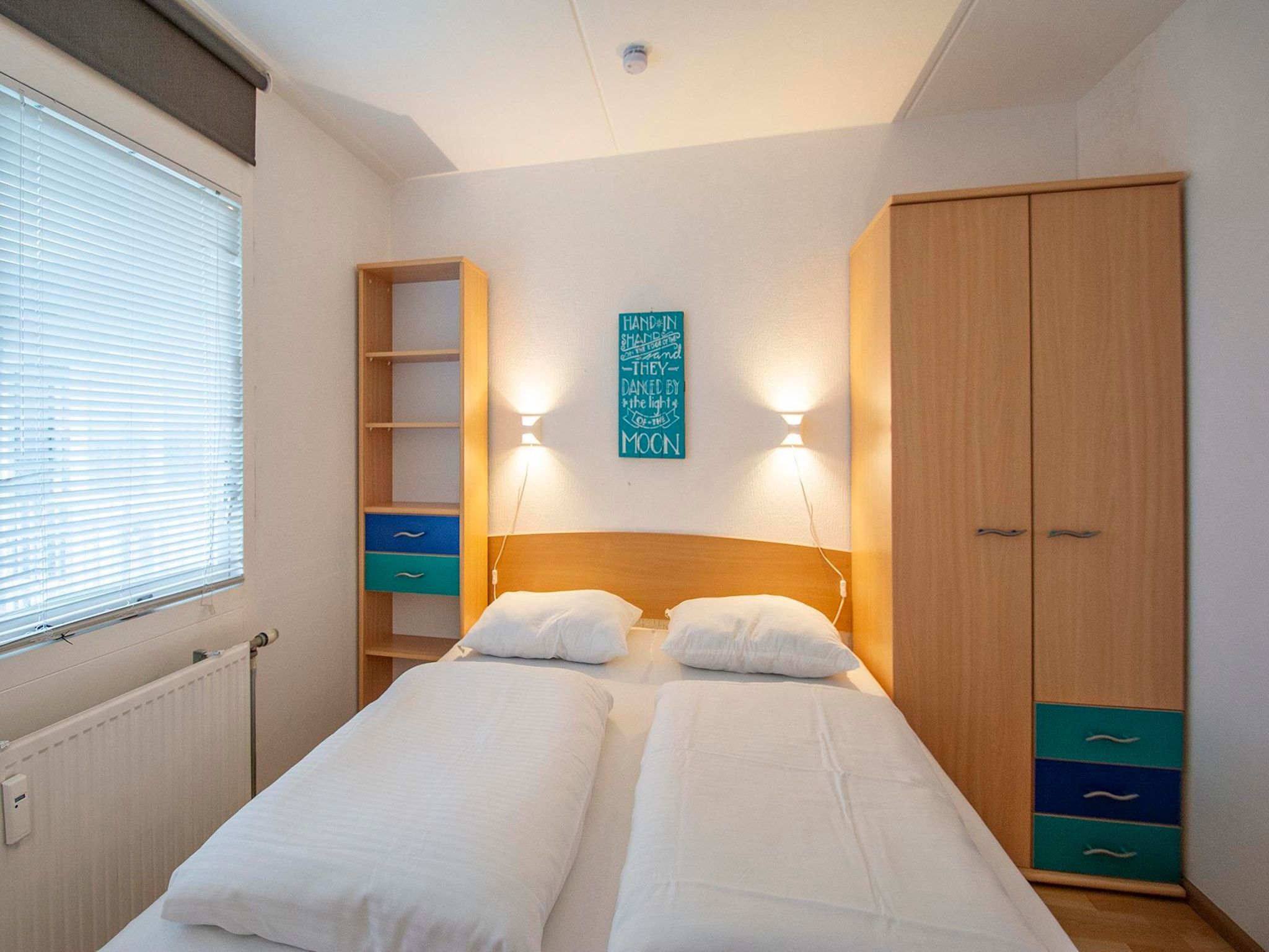 Een slaapkamer van Beach Appartement 25 in Callantsoog