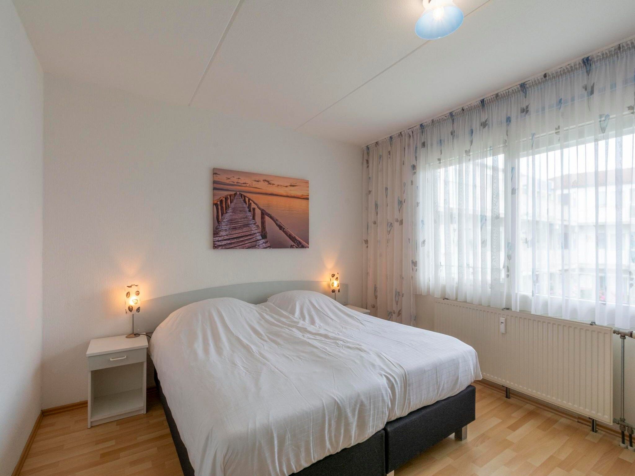 Een slaapkamer van Beach Appartement 29 in Callantsoog